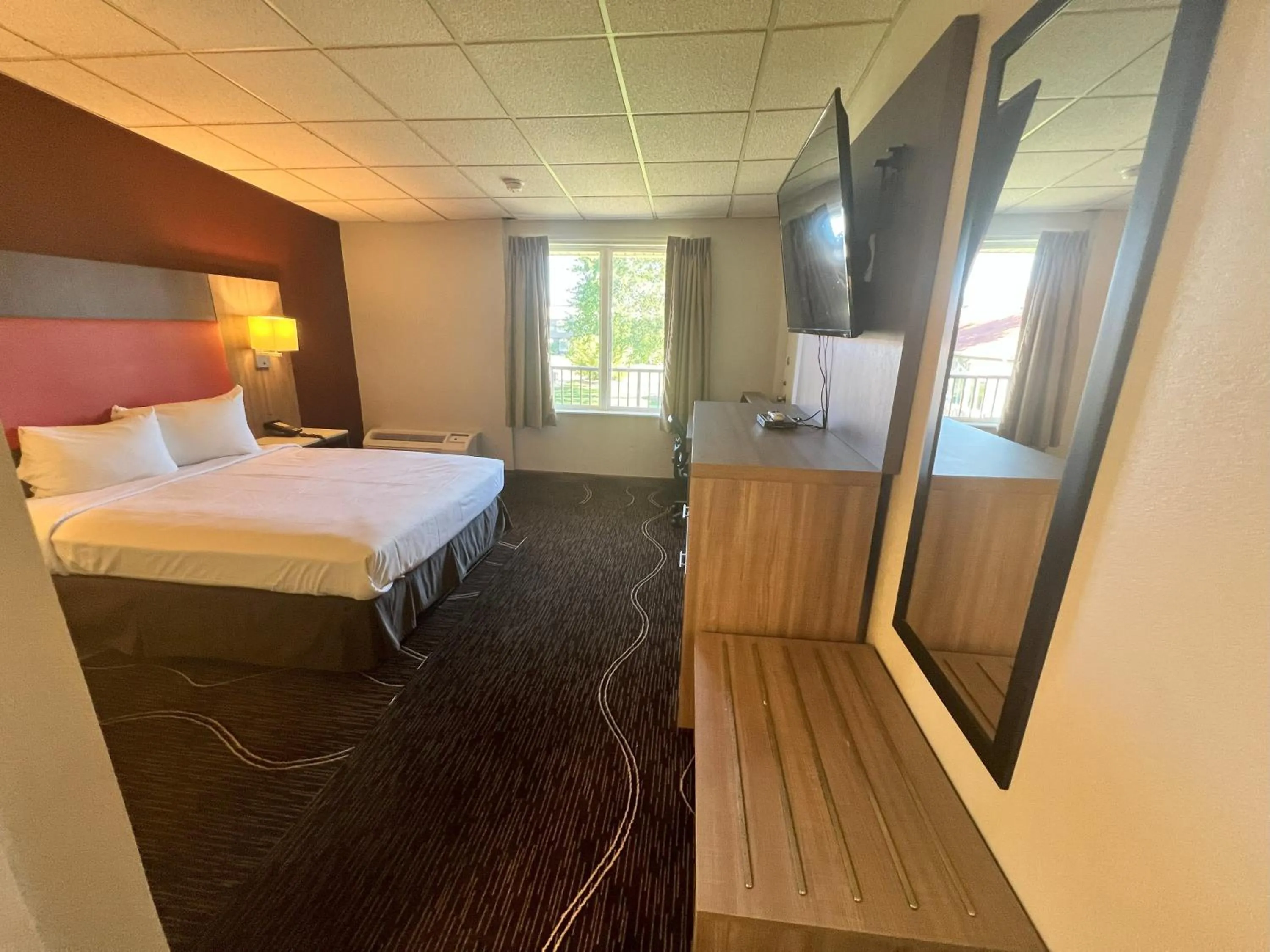 Bed in Countryside Suites Kansas City Independence I-70 East Sports Complex Hotel