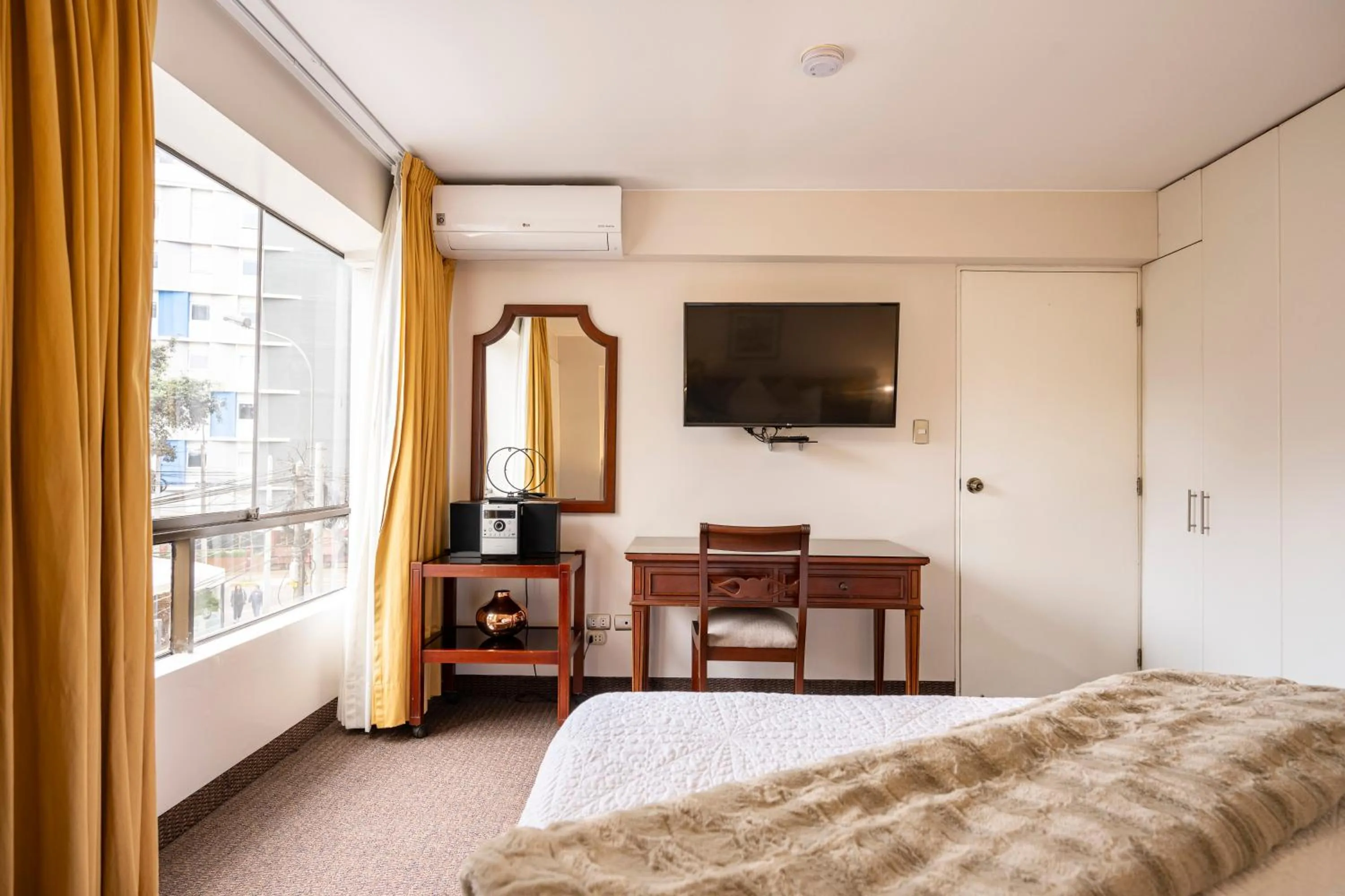 Bed in Apart Hotel San Martin