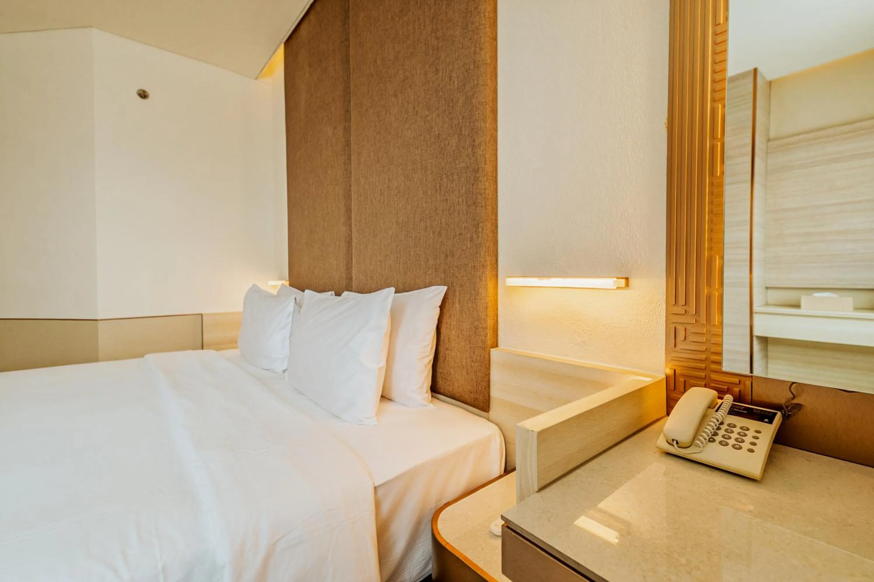 Bed in Gino Feruci Braga by KAGUM Hotels