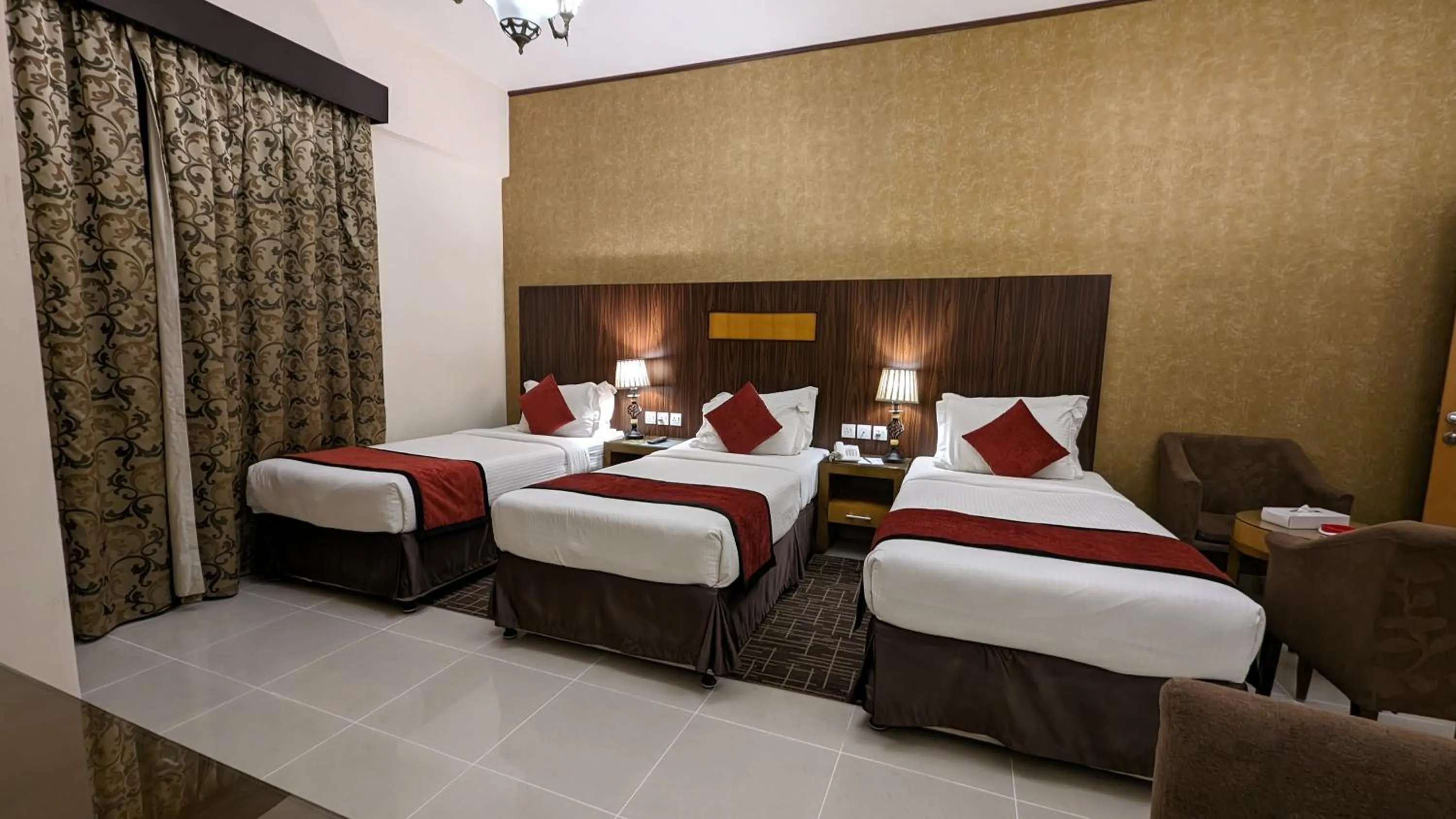 Bed in City Tower Hotel