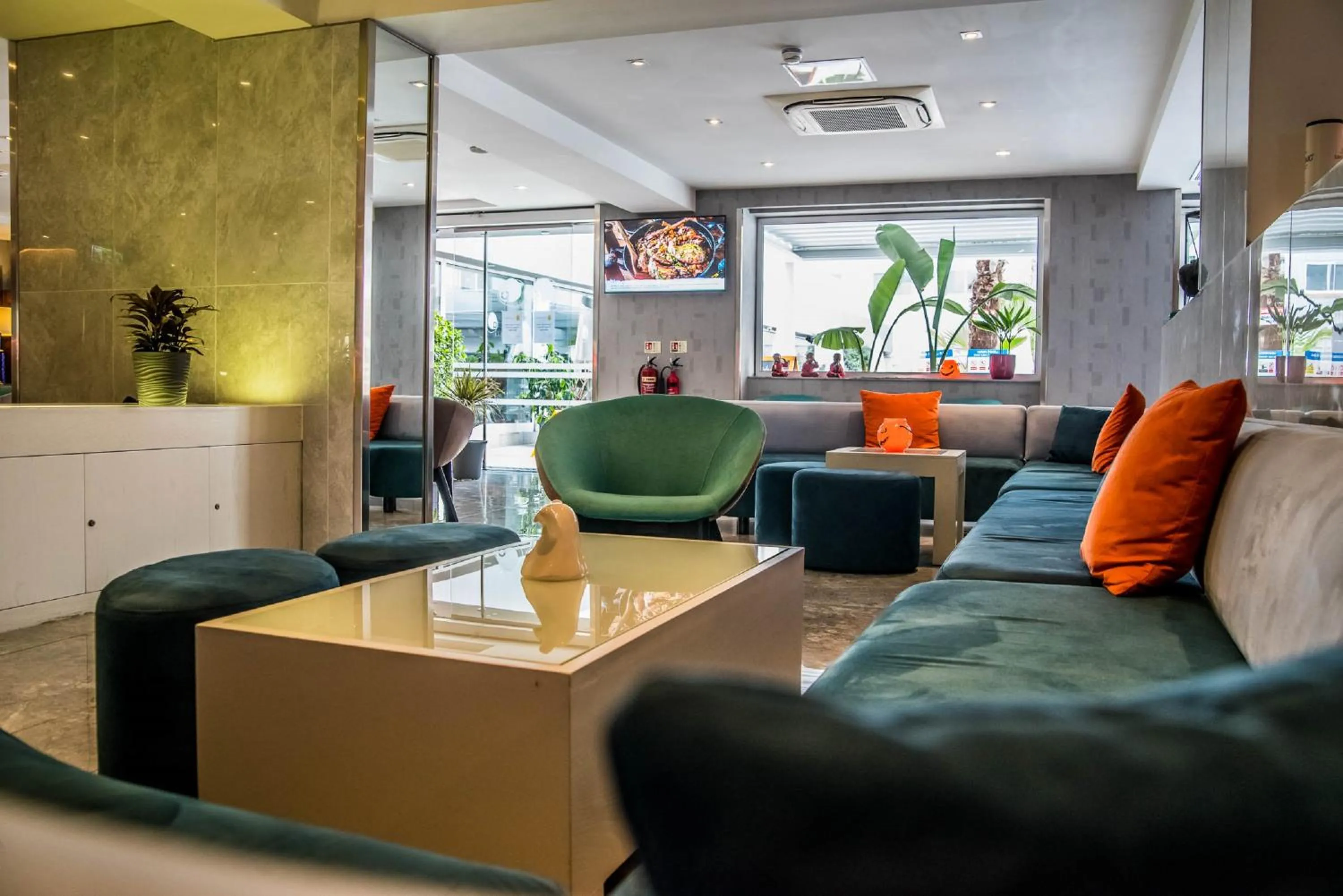 Lobby or reception in Pebbles Resort