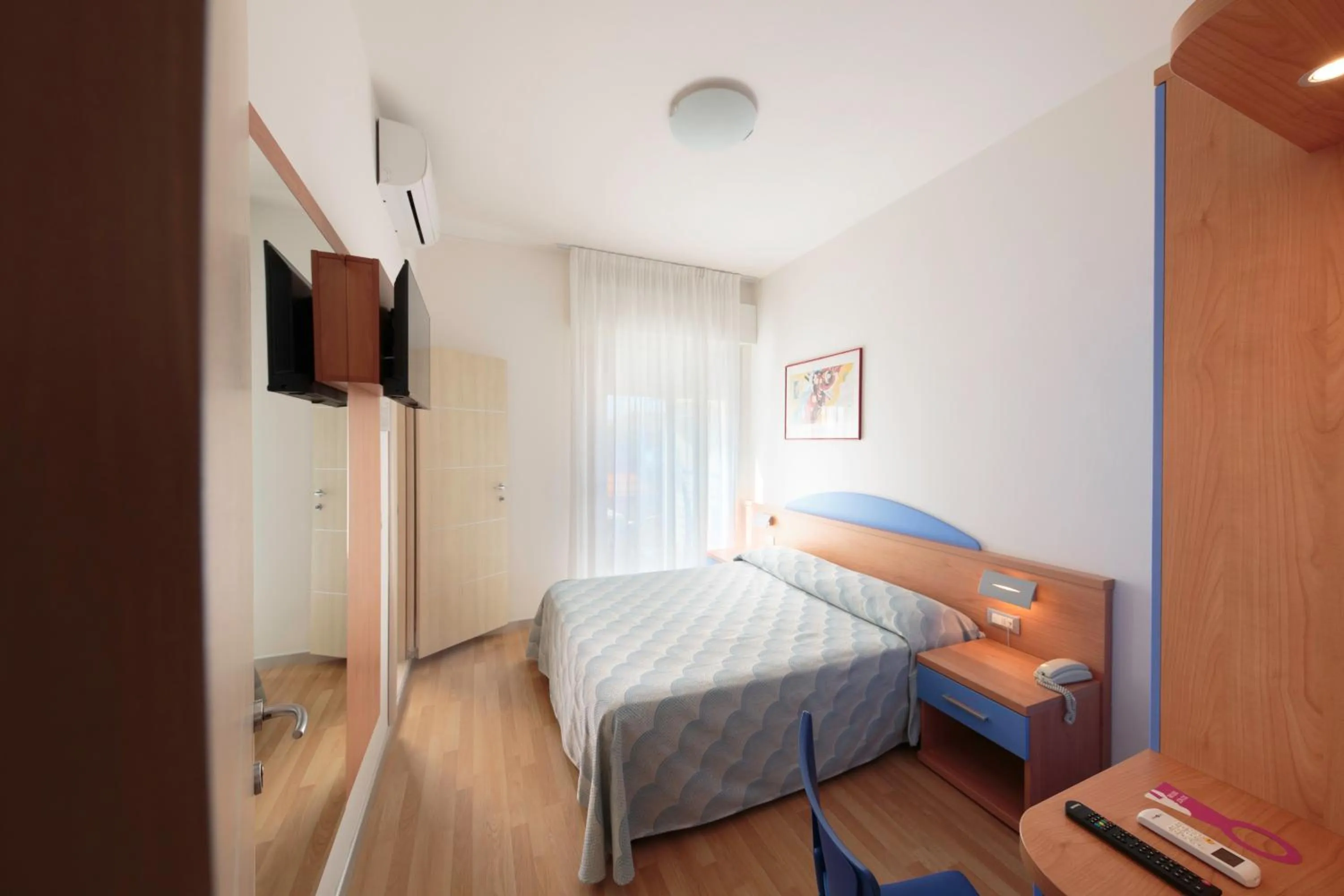 Bed in Hotel Riviera