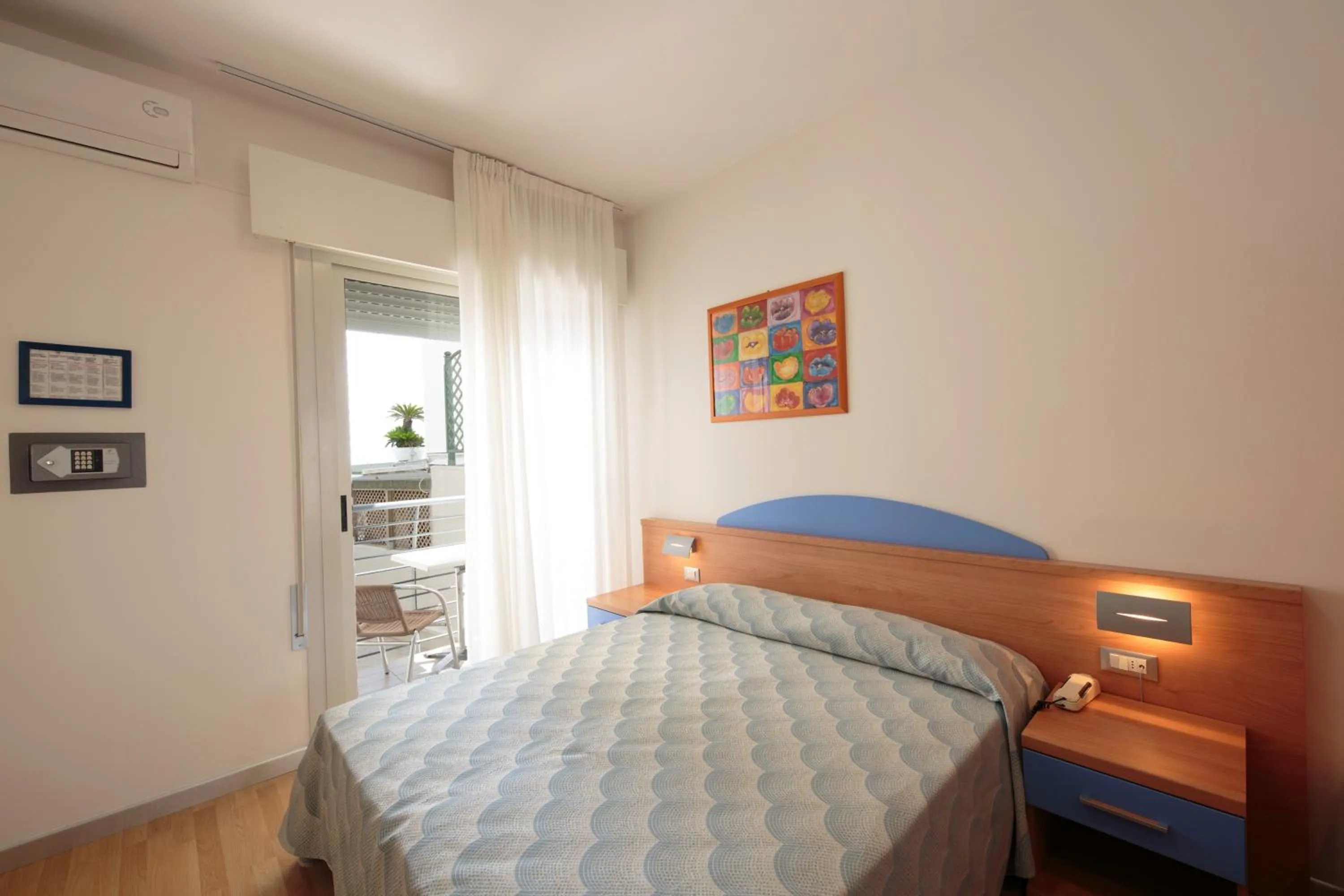 Bed in Hotel Riviera