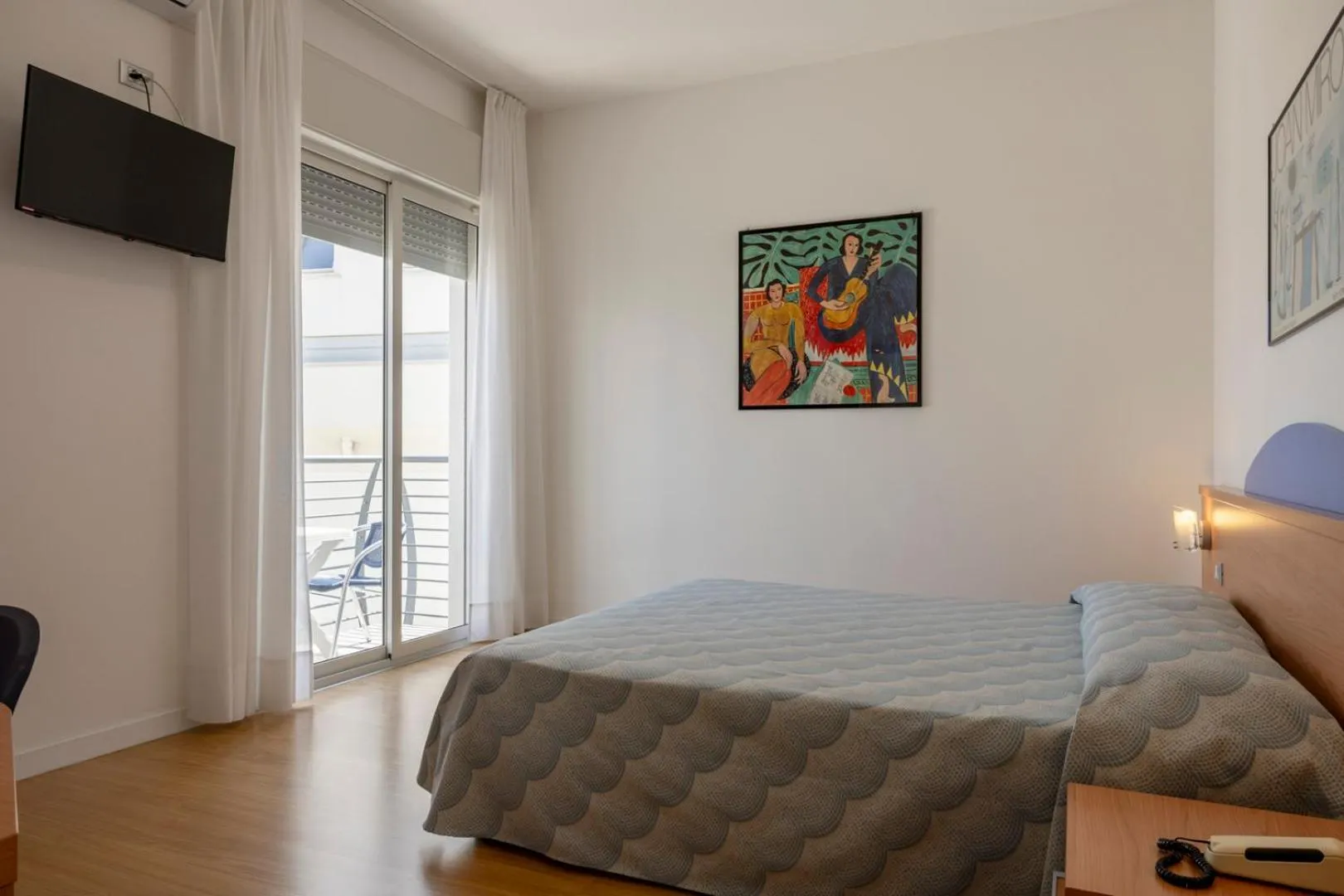 Bed in Hotel Riviera