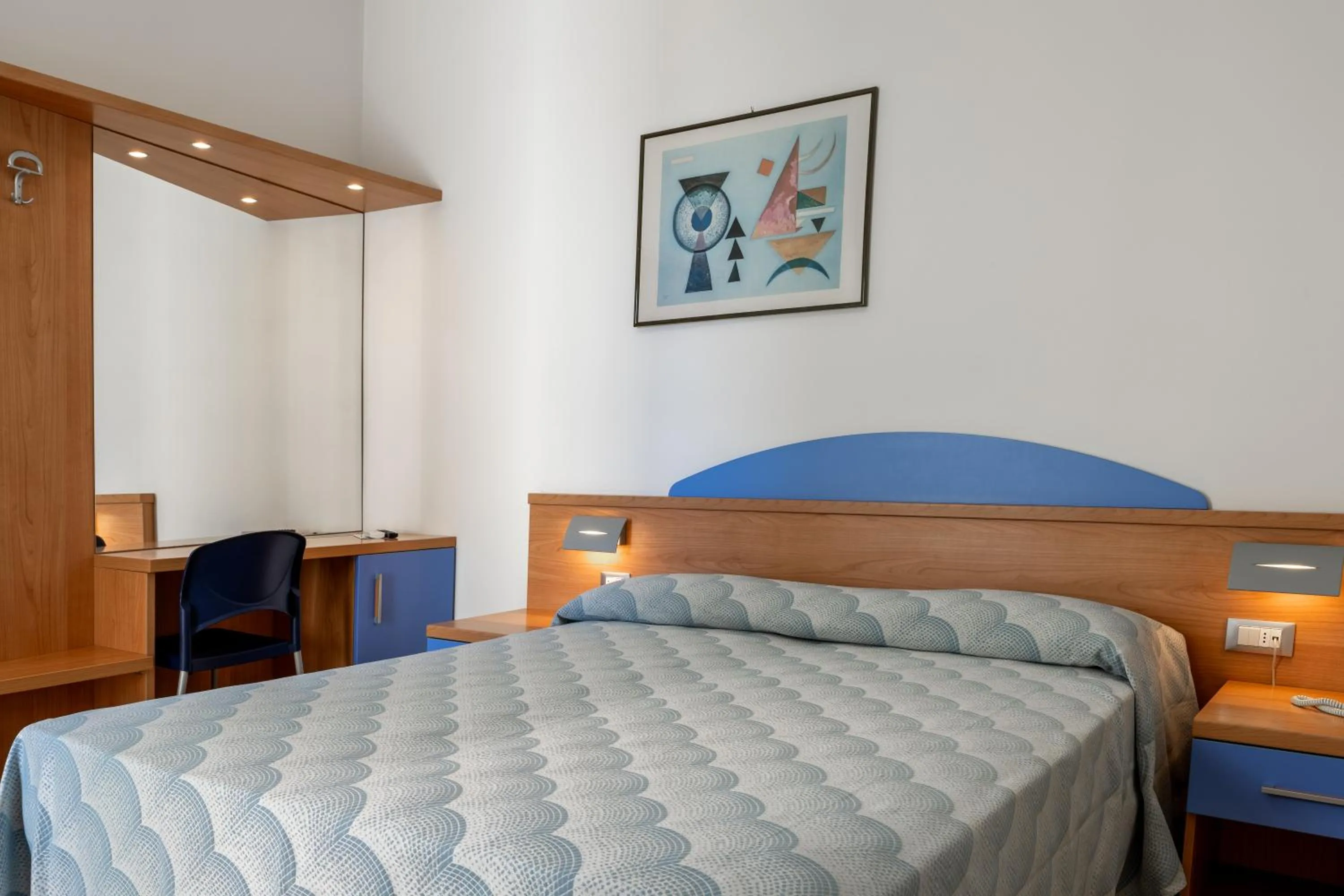 Bed in Hotel Riviera