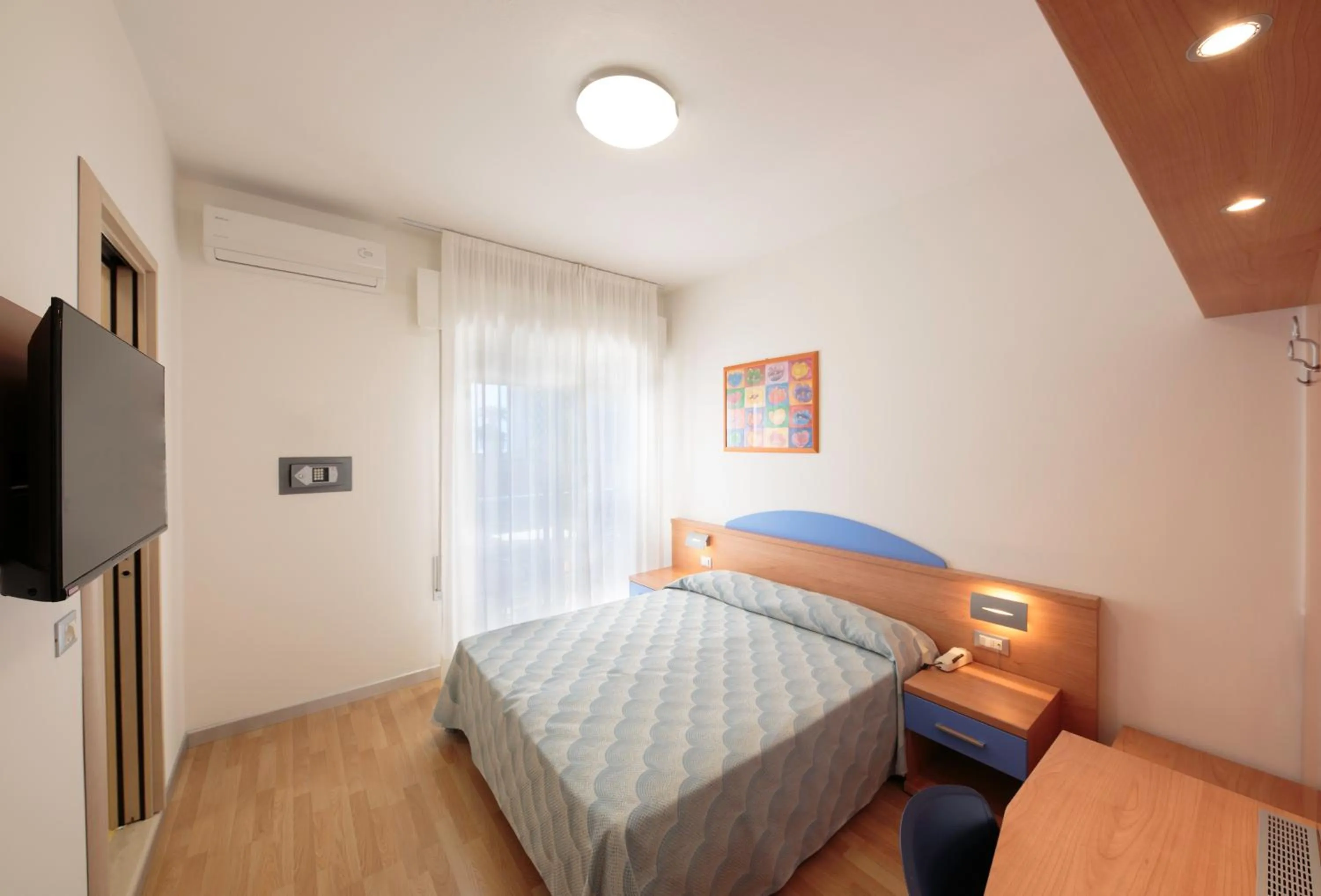 Bed in Hotel Riviera