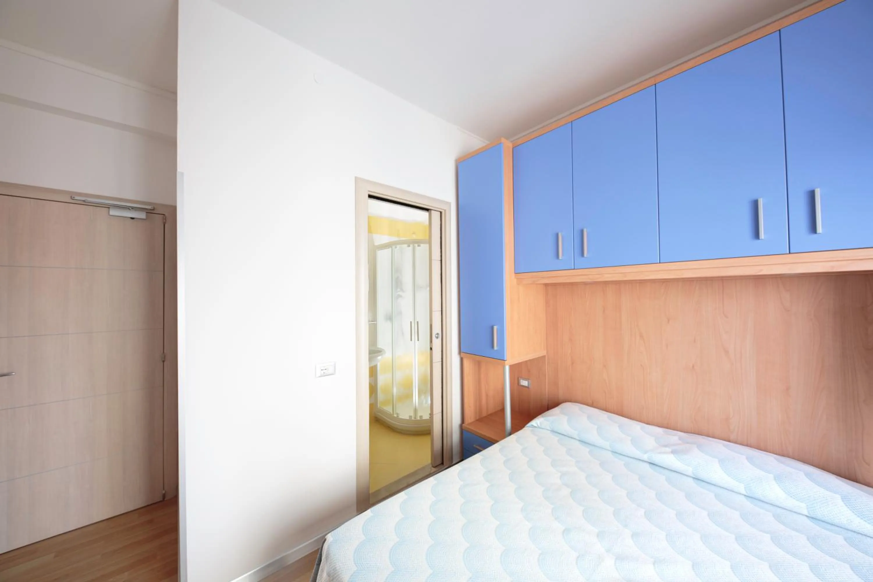 Bed in Hotel Riviera