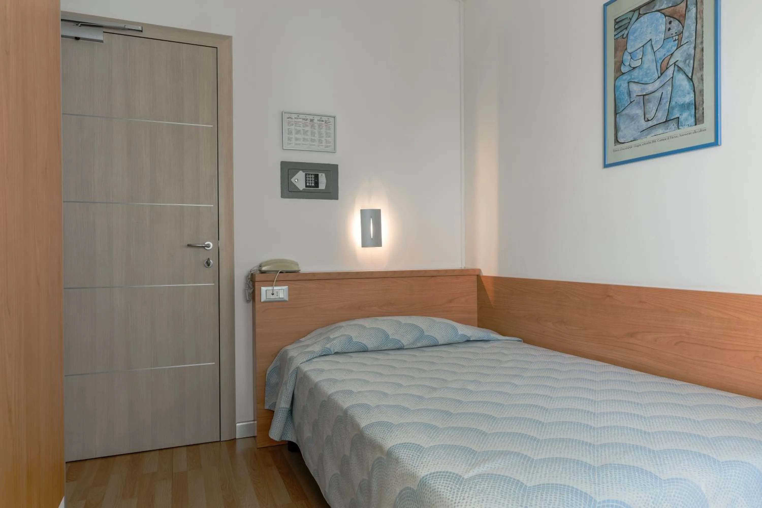 Bed in Hotel Riviera