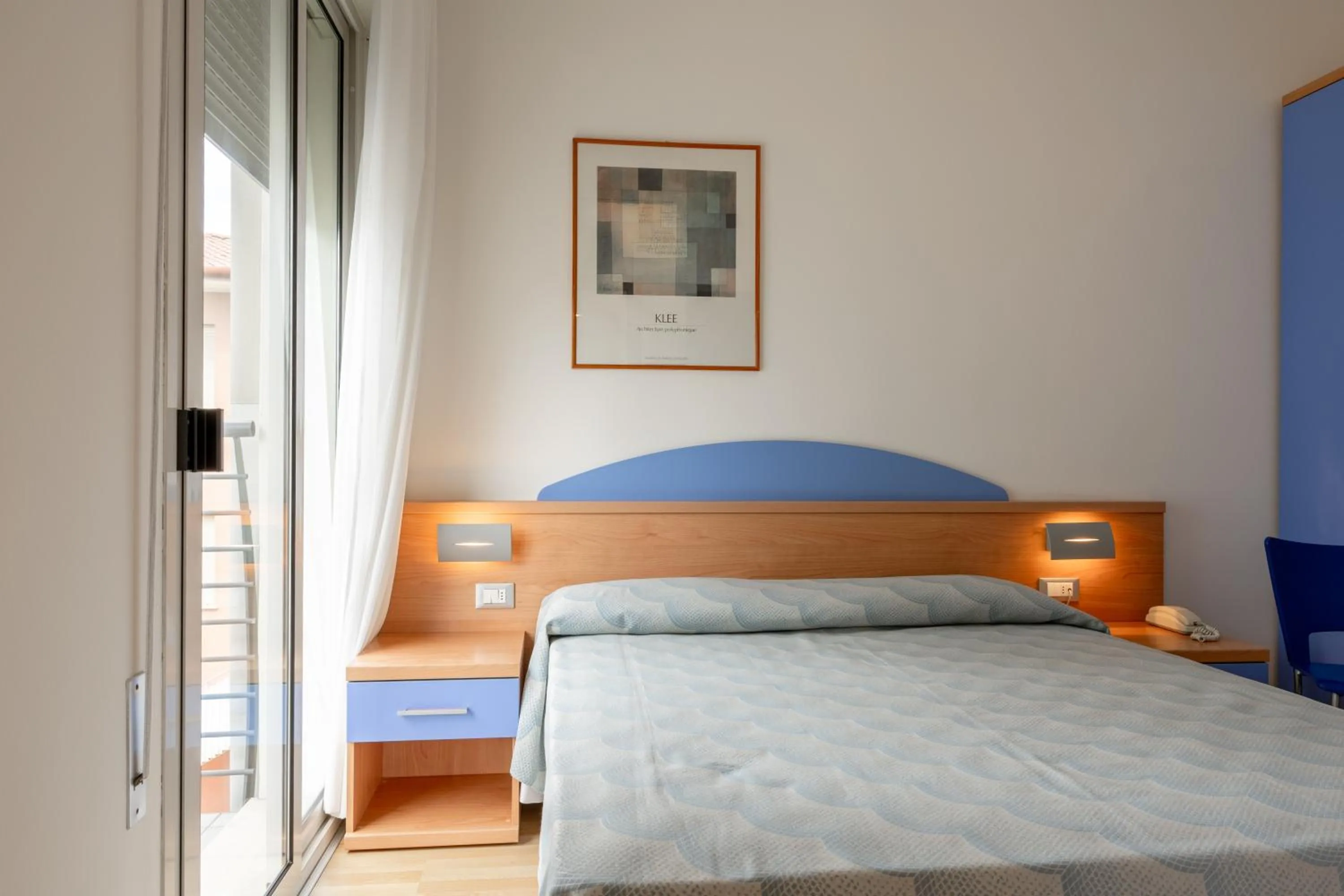 Bed in Hotel Riviera