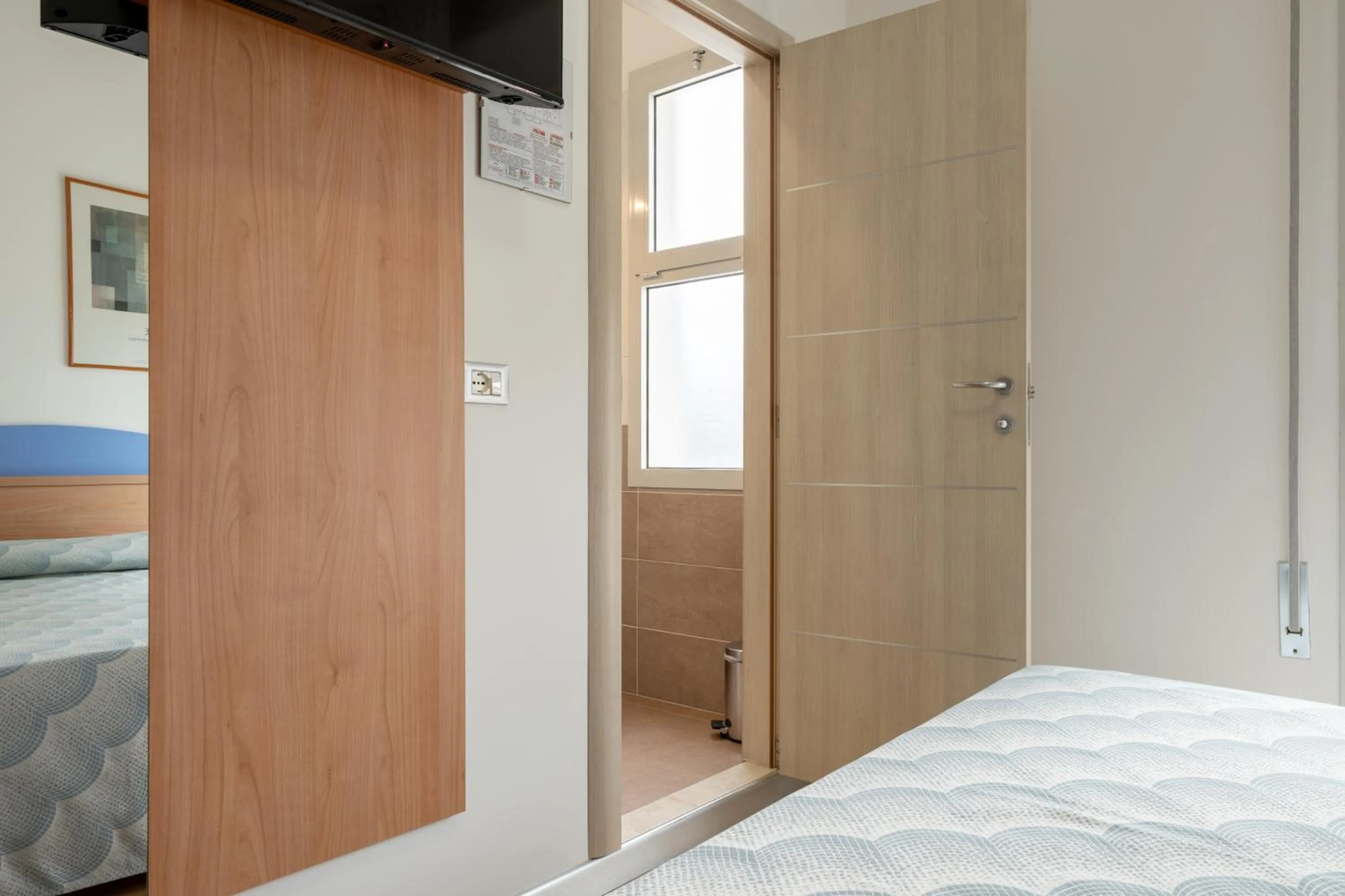 Bed in Hotel Riviera