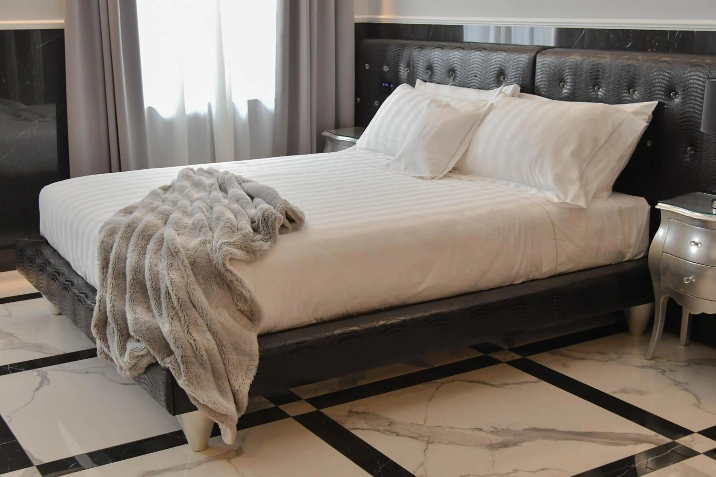 Bed in The Unique Brera Suites