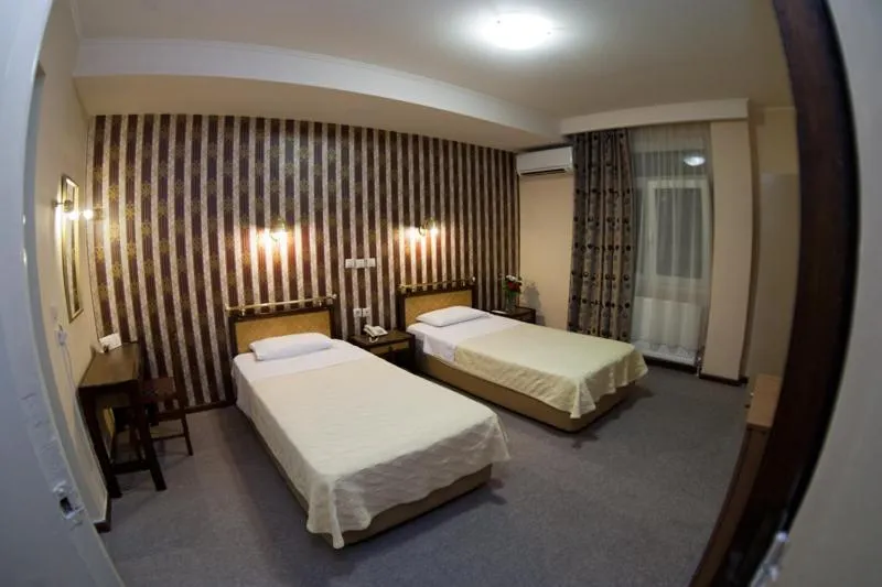 Bed in Olympos Hotel