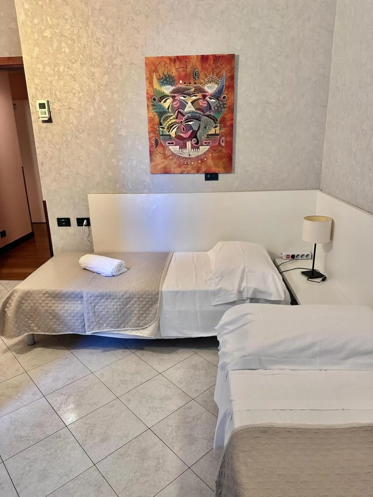 Bed in Hotel Residence Mondial