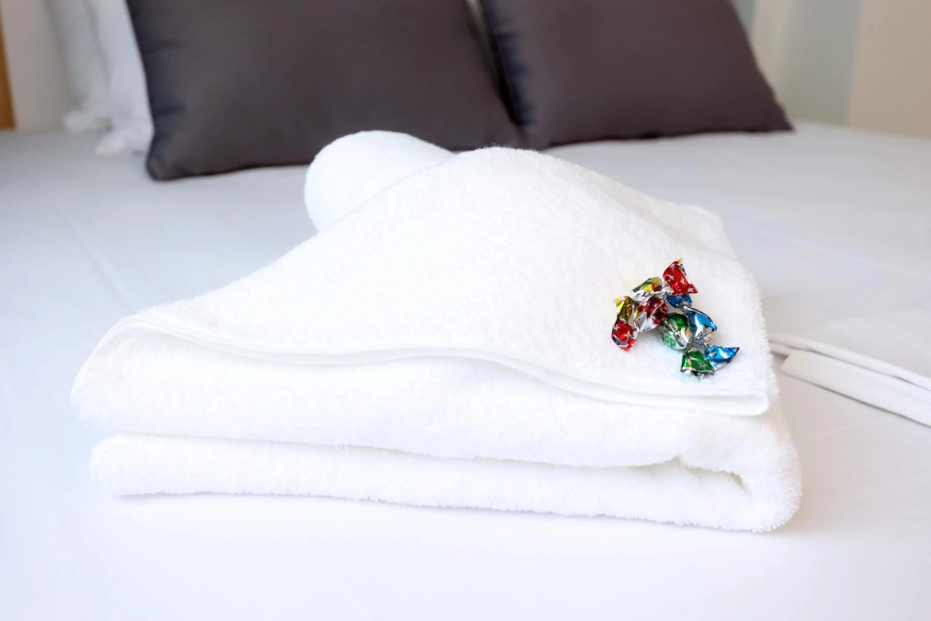 towels, Bed in Old Town Hall Suites and Apartments