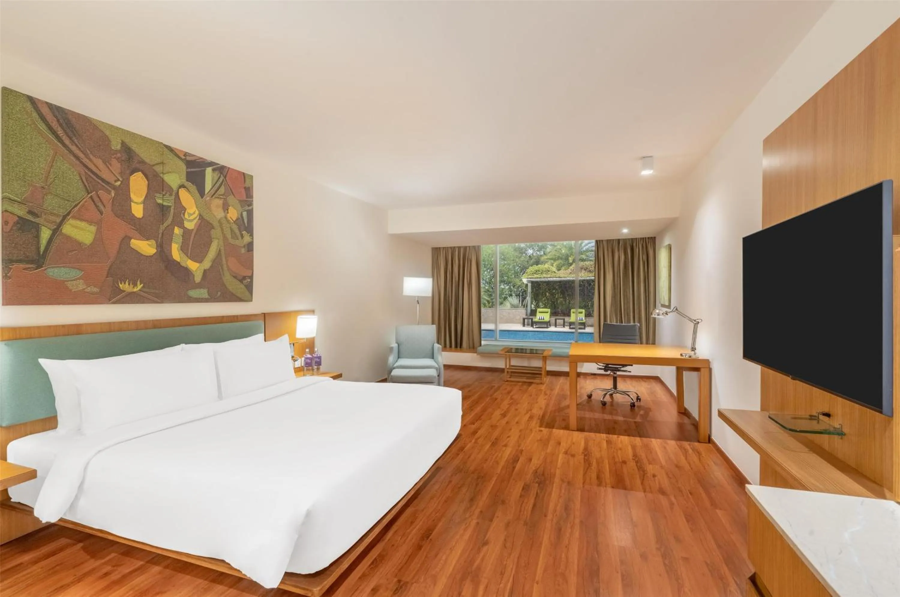 Pool view, Bed in Radisson Blu Plaza Hotel Hyderabad Banjara Hills