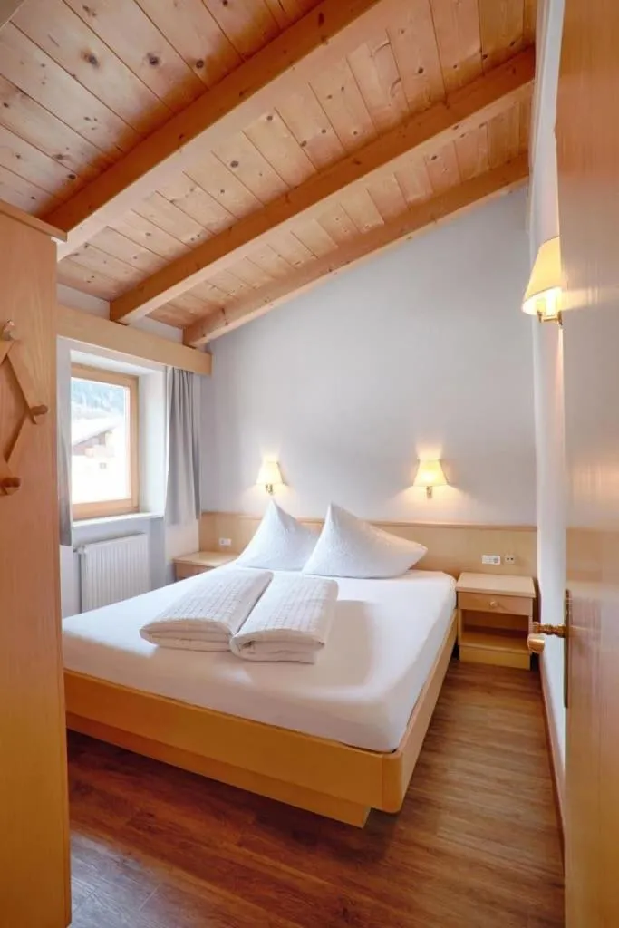 Bed in Mountain Living Apartments