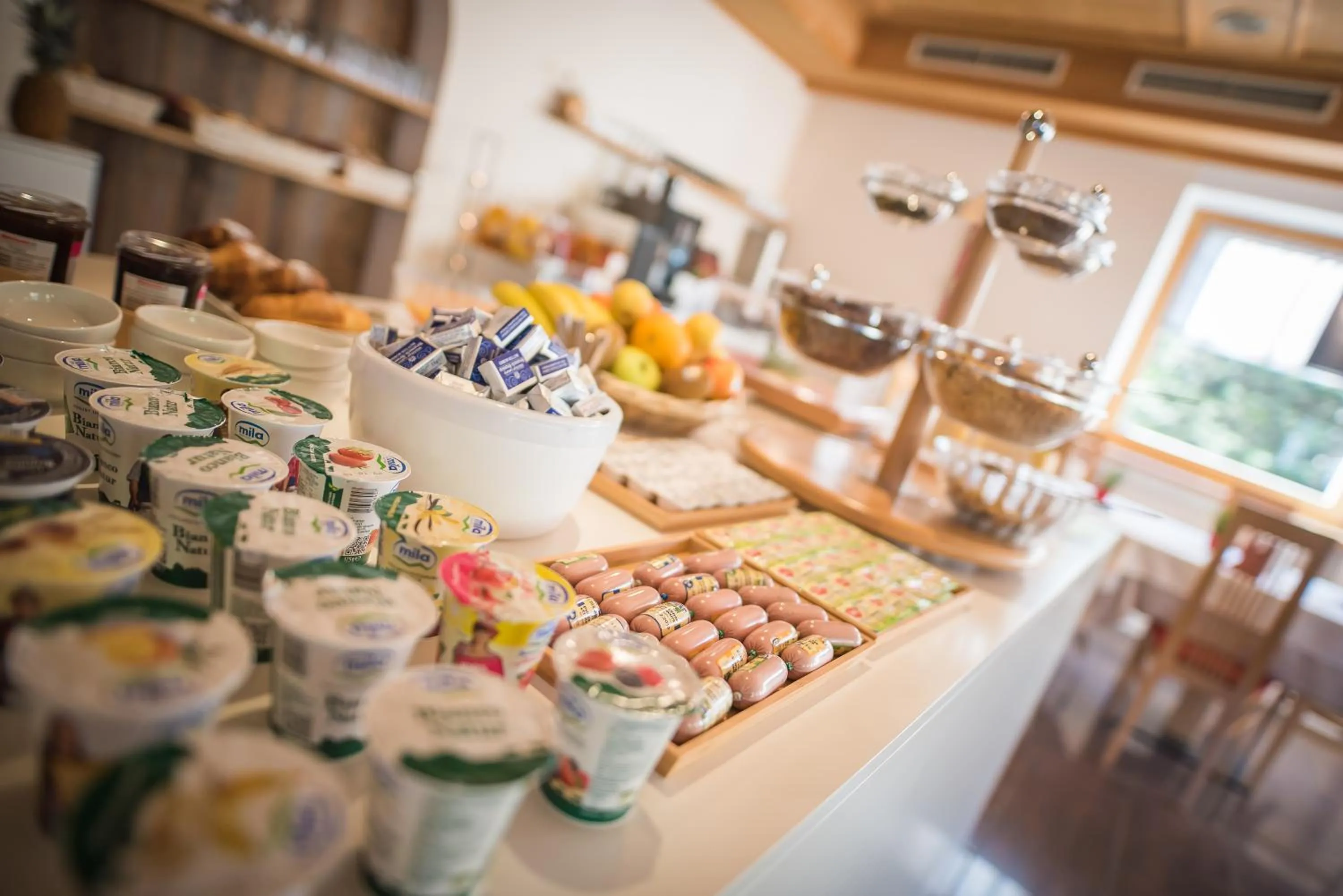 Italian breakfast in Mountain Living Apartments