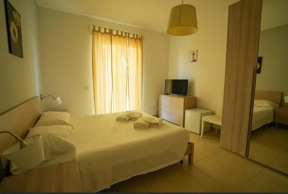 Bed in Isa Residence Fiumicino Airport