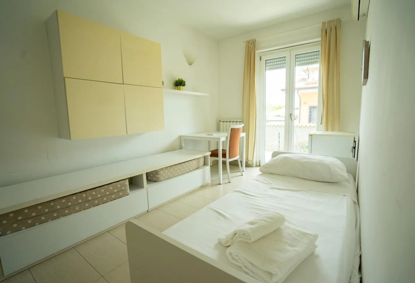 Bed in Isa Residence Fiumicino Airport