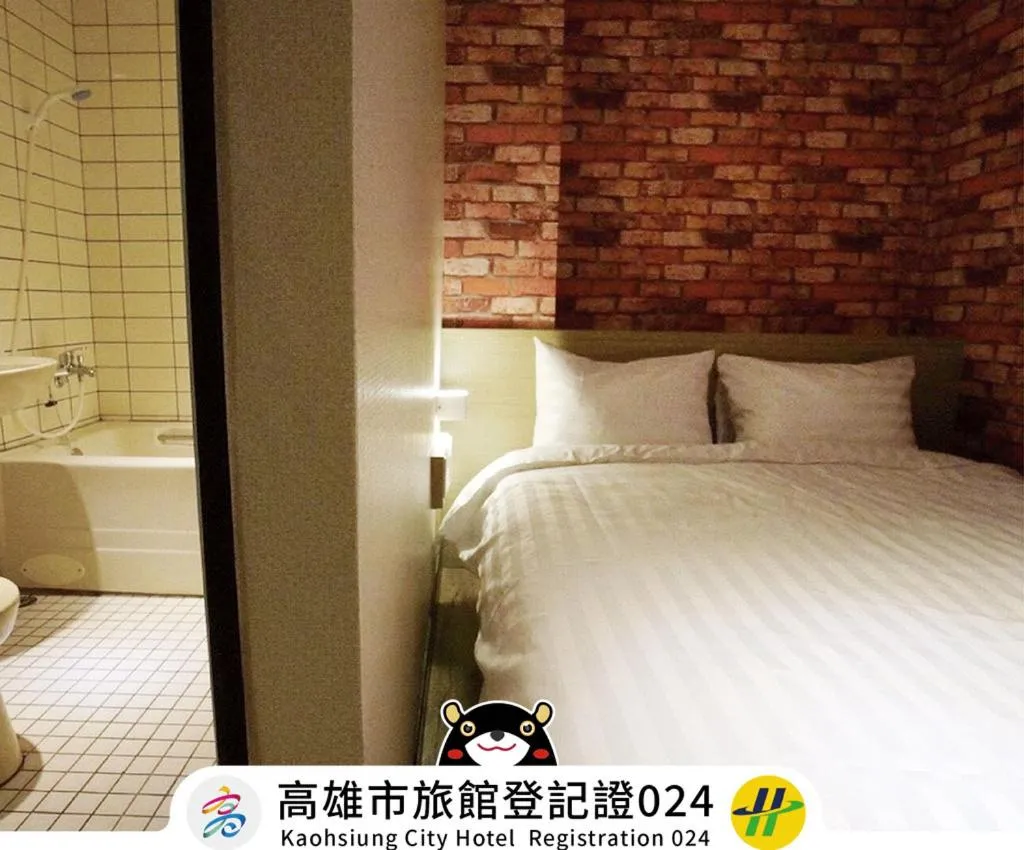 Bed in Win Inn Kaohsiung Hotel