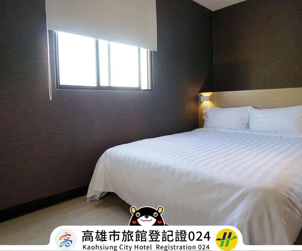 Bed in Win Inn Kaohsiung Hotel