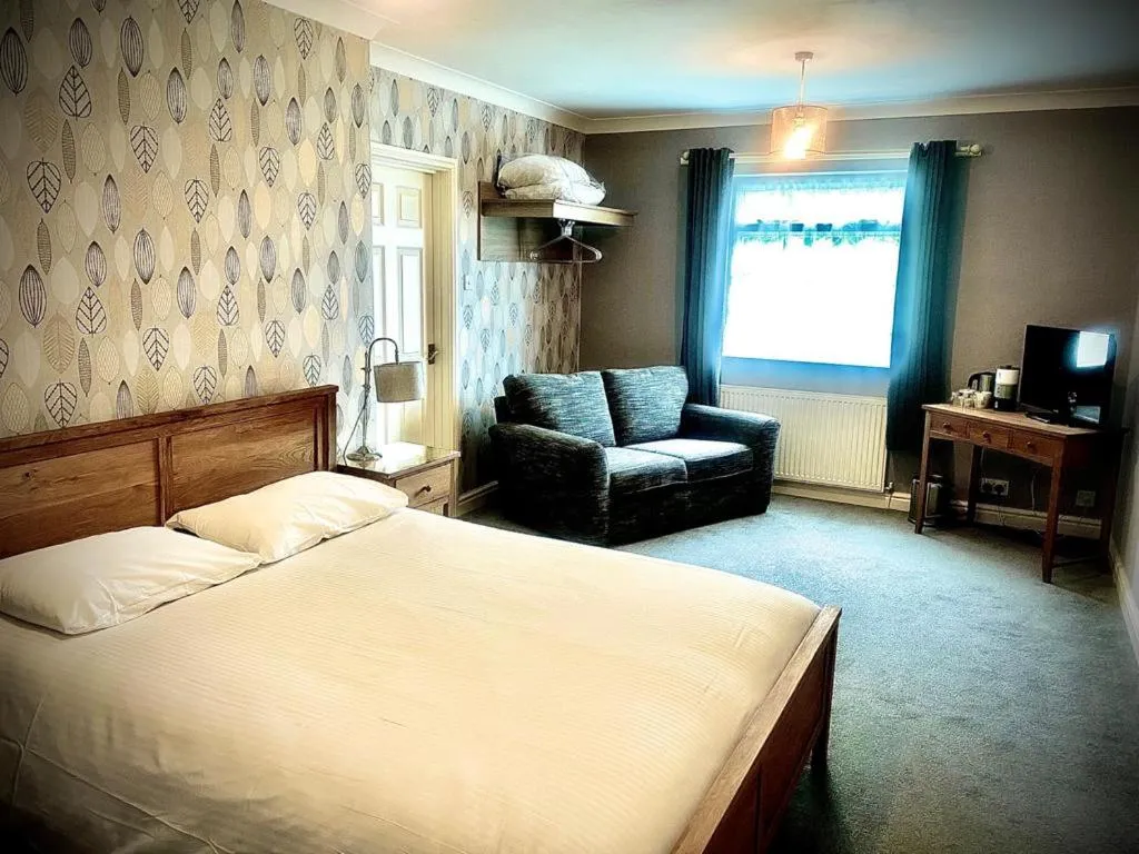 Bed in Woodcote Hotel