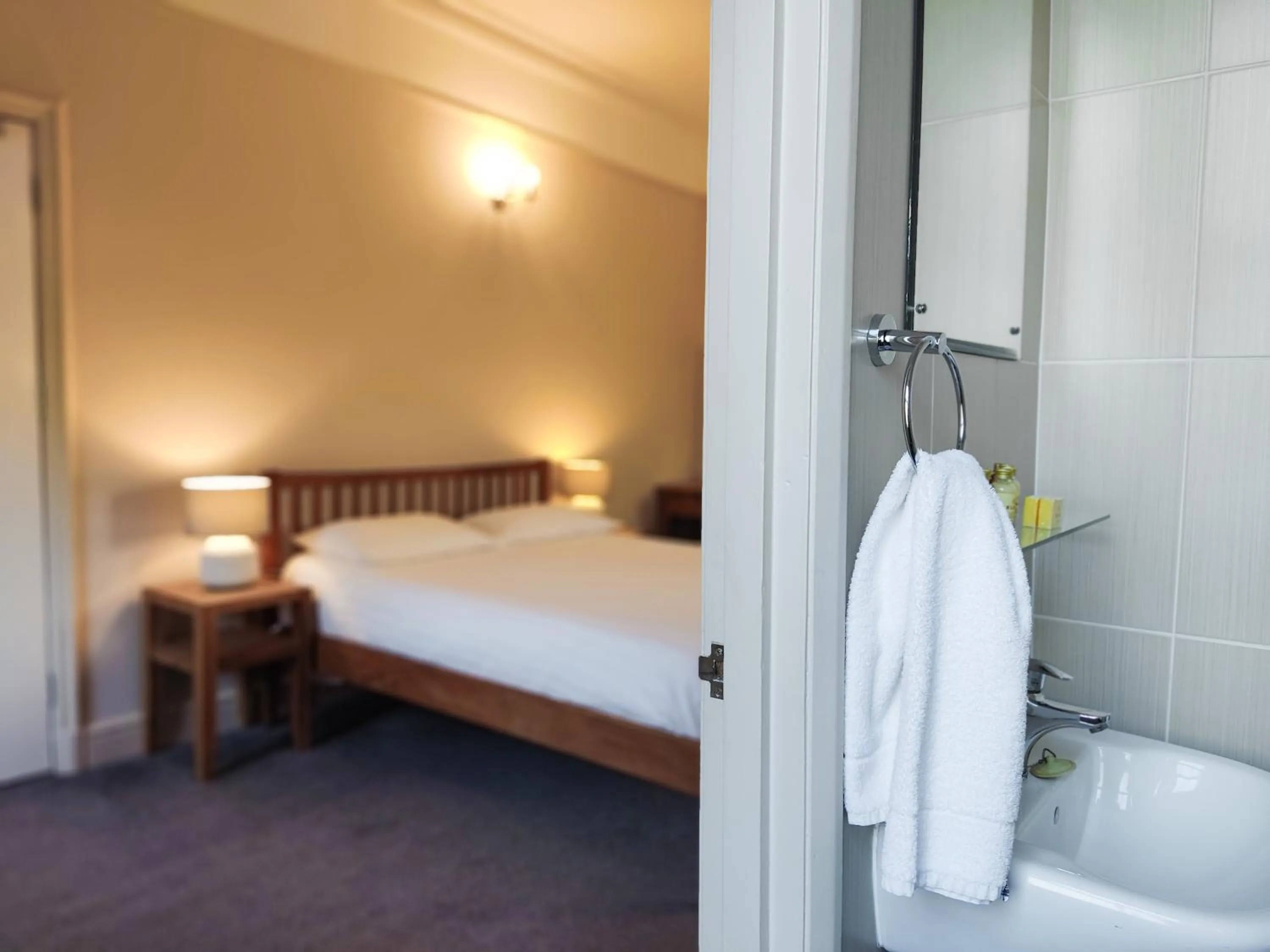 Bed in Woodcote Hotel