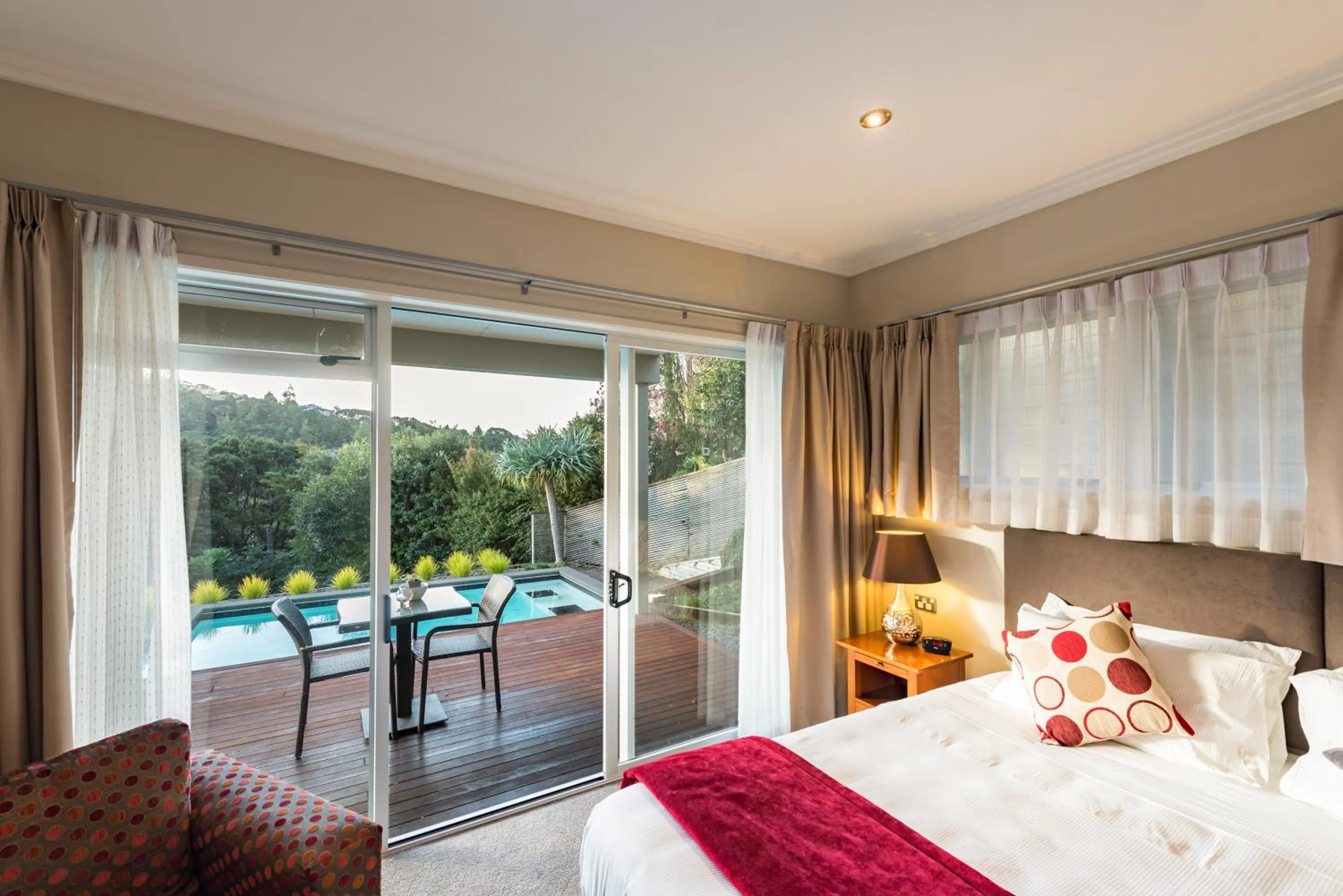 Pool view, Bed in Decks of Paihia