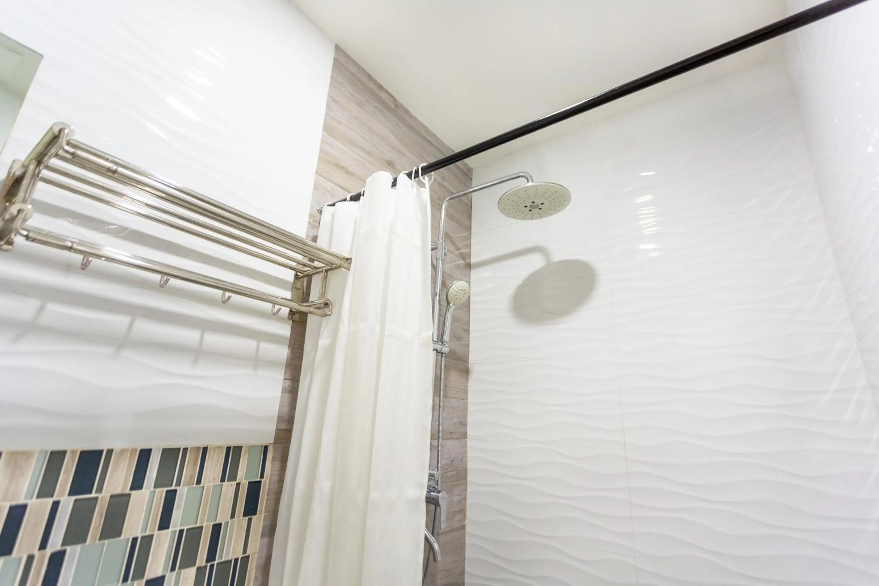 Shower in The Rooms by Alinace at Mango Hotel