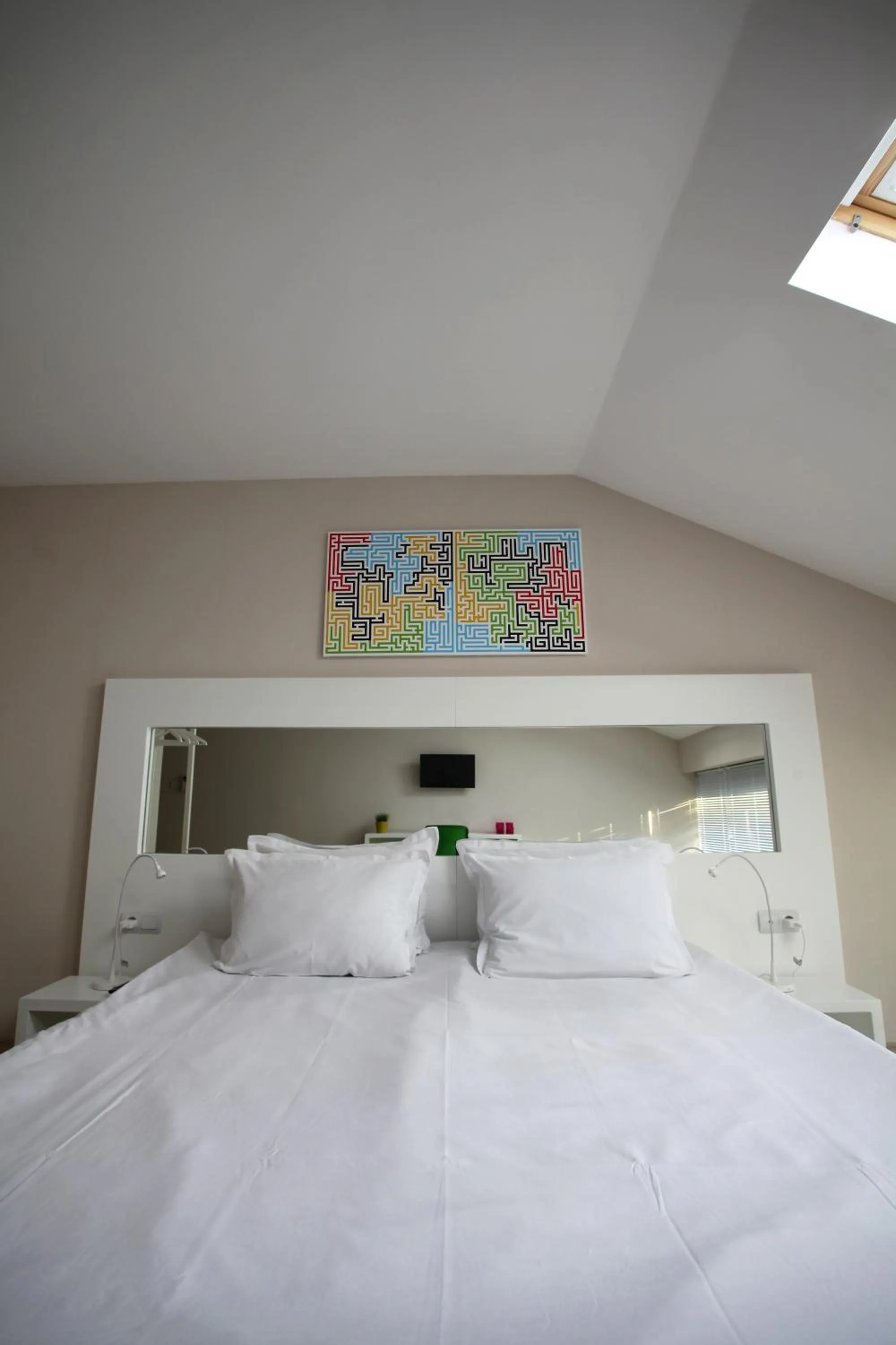 Bed in Executive Rooms and Suites Play