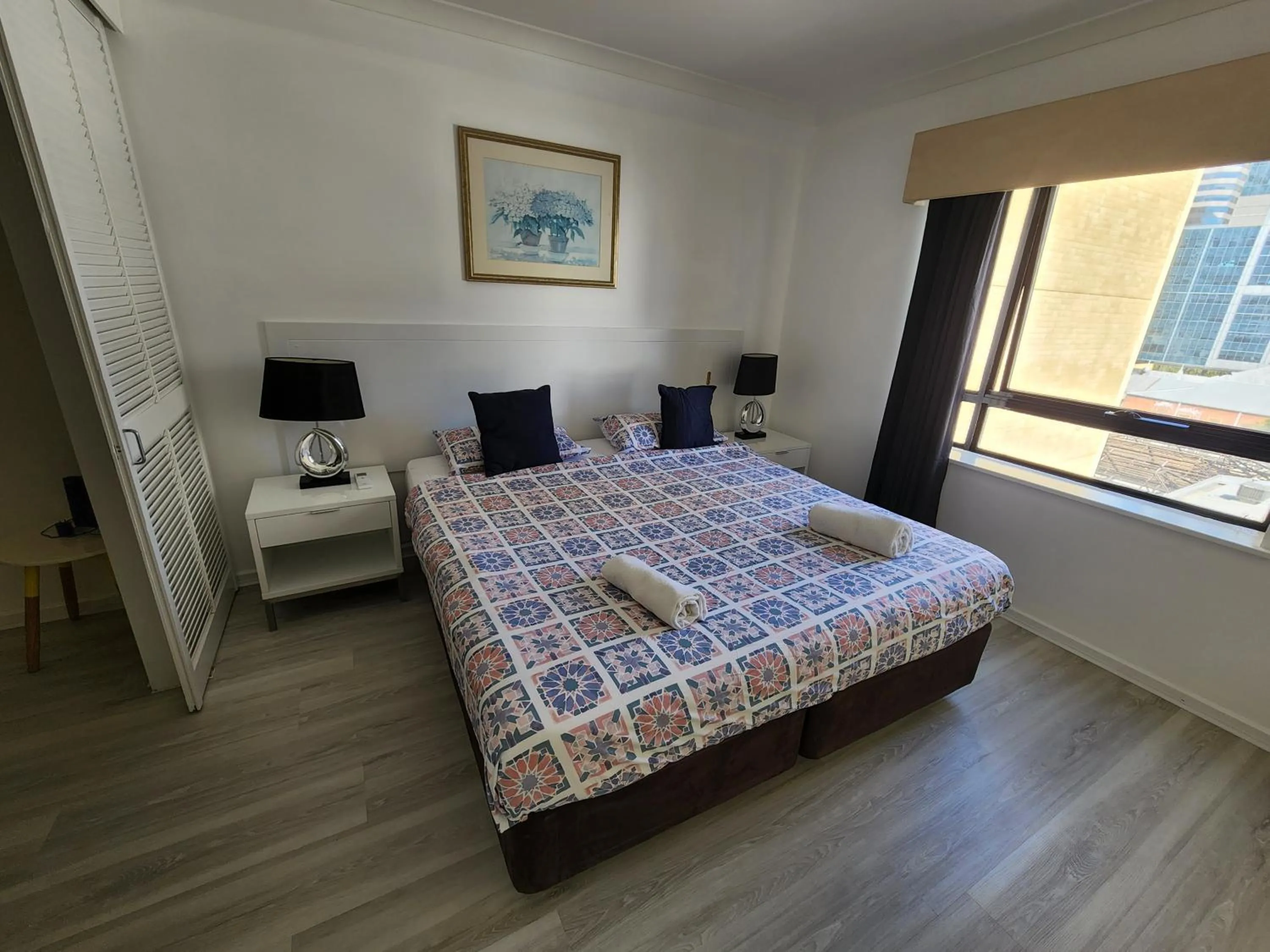 Bed in PERTH CBD APARTMENTS