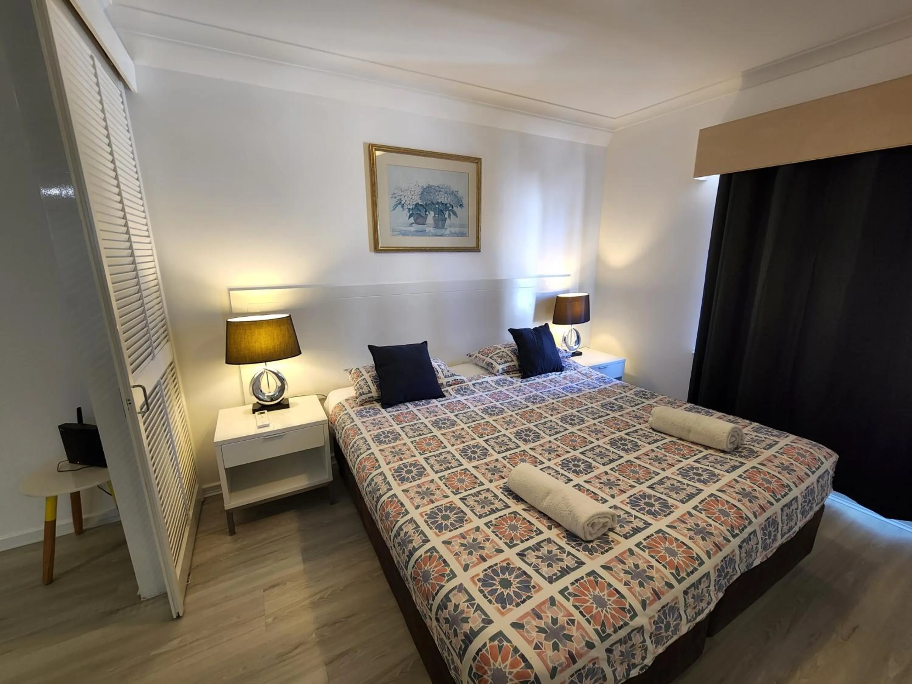 Bed in PERTH CBD APARTMENTS