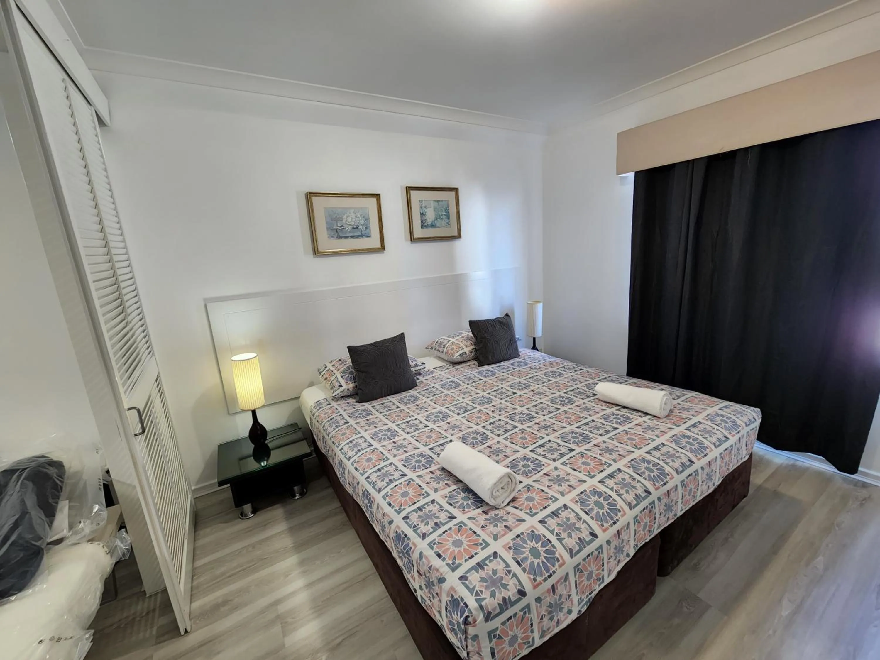 Bed in PERTH CBD APARTMENTS