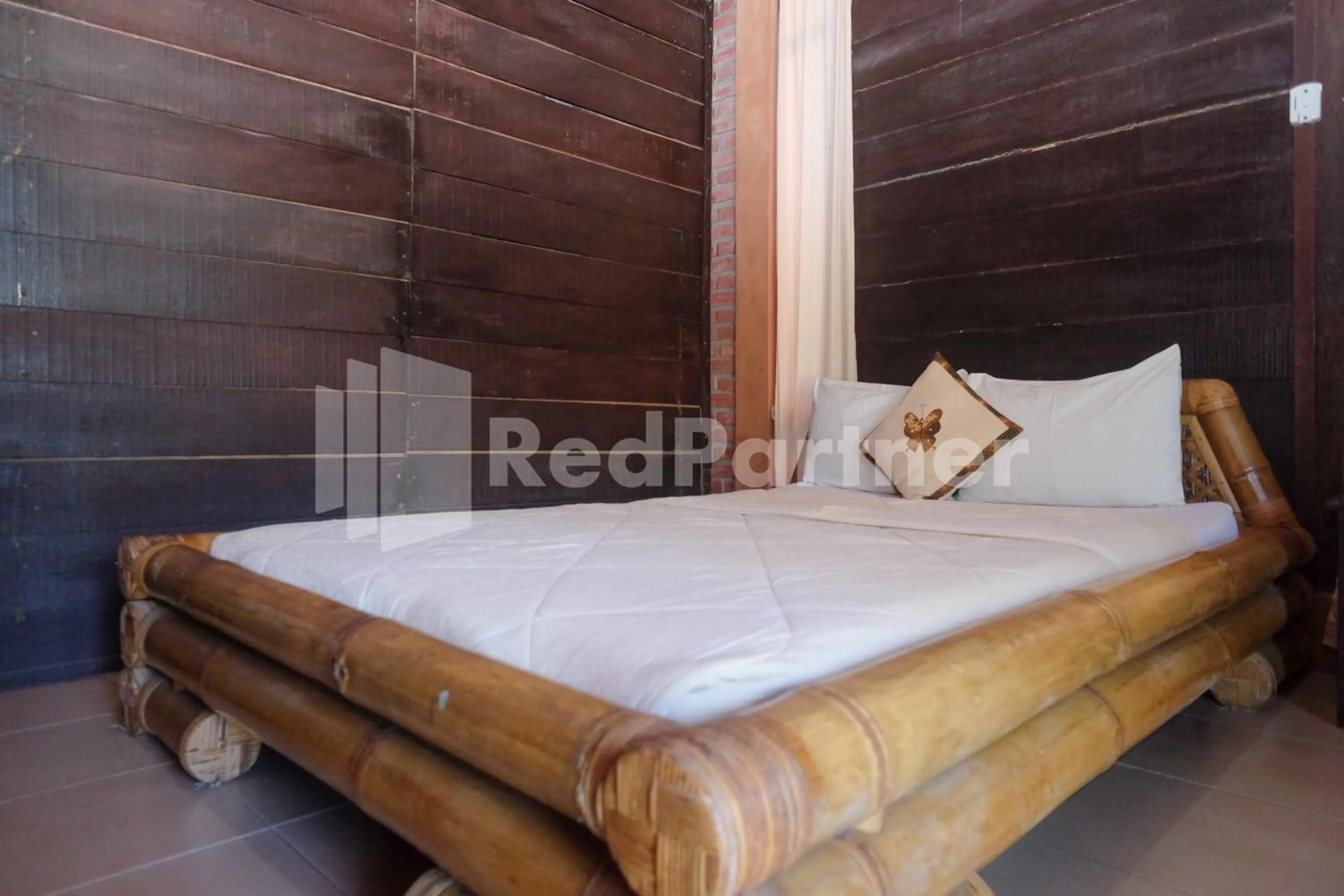 Bed in Kebon Krapyak Cottage Syariah Mitra RedDoorz near Stadion Maguwoharjo