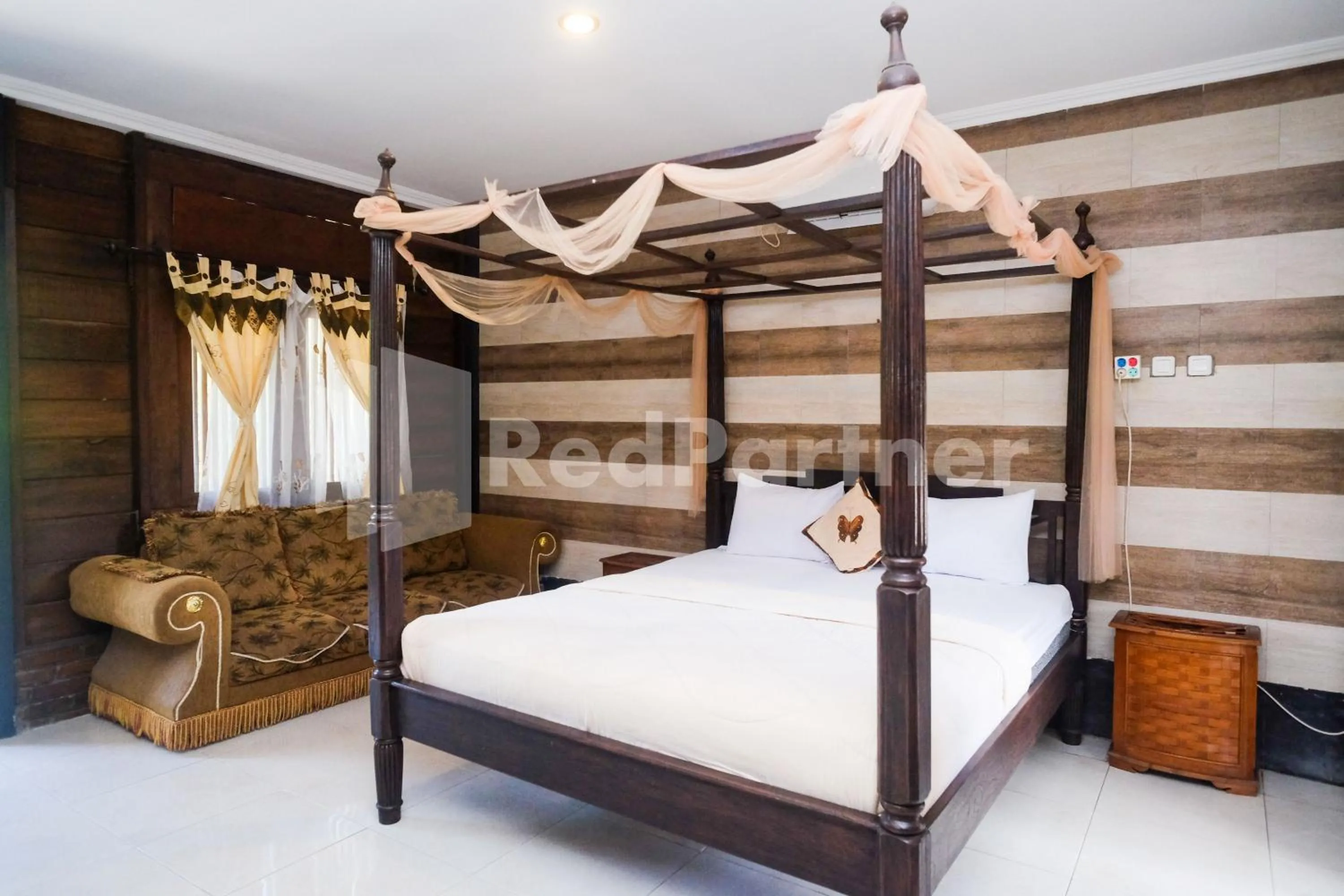 Bed in Kebon Krapyak Cottage Syariah Mitra RedDoorz near Stadion Maguwoharjo