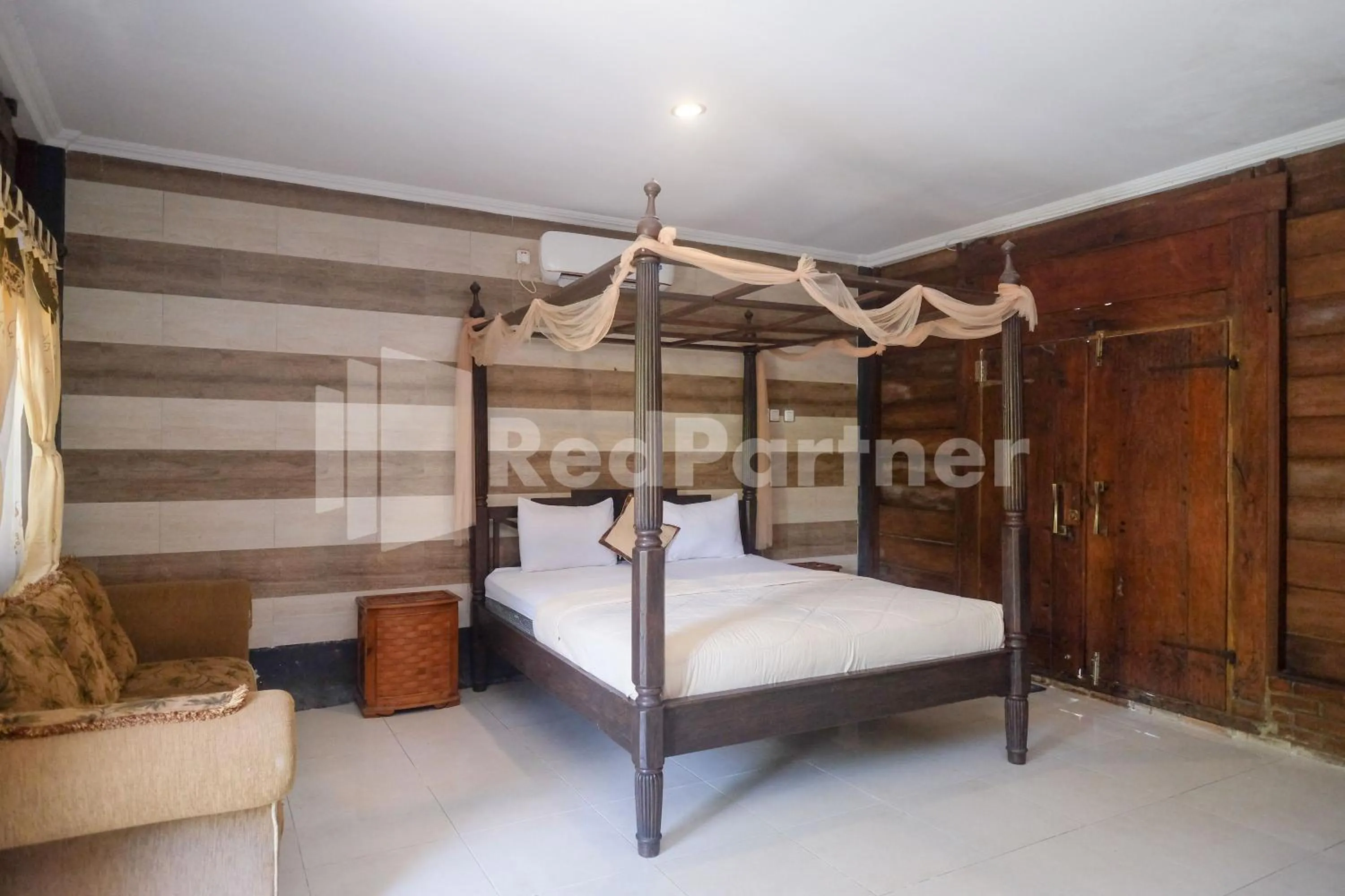 Bed in Kebon Krapyak Cottage Syariah Mitra RedDoorz near Stadion Maguwoharjo