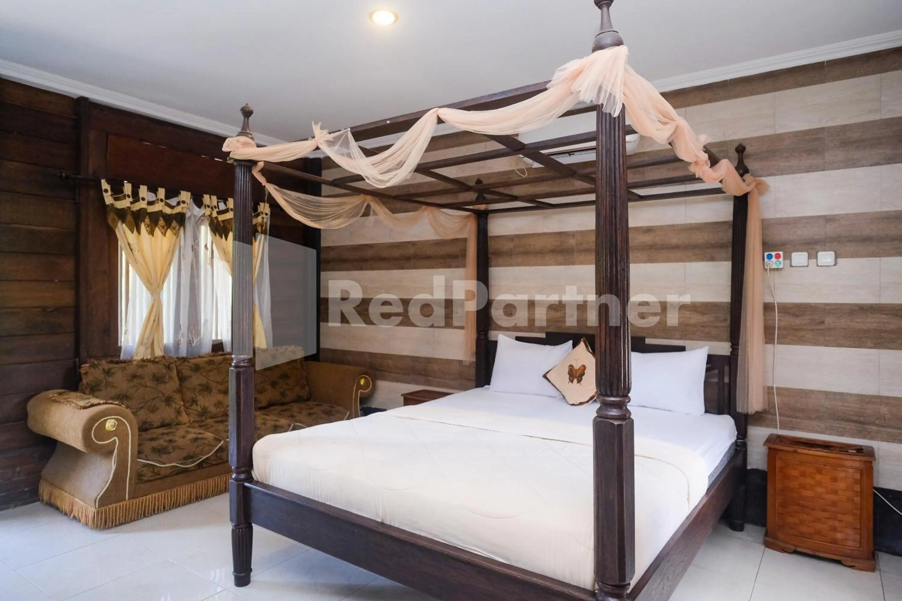 Bed in Kebon Krapyak Cottage Syariah Mitra RedDoorz near Stadion Maguwoharjo