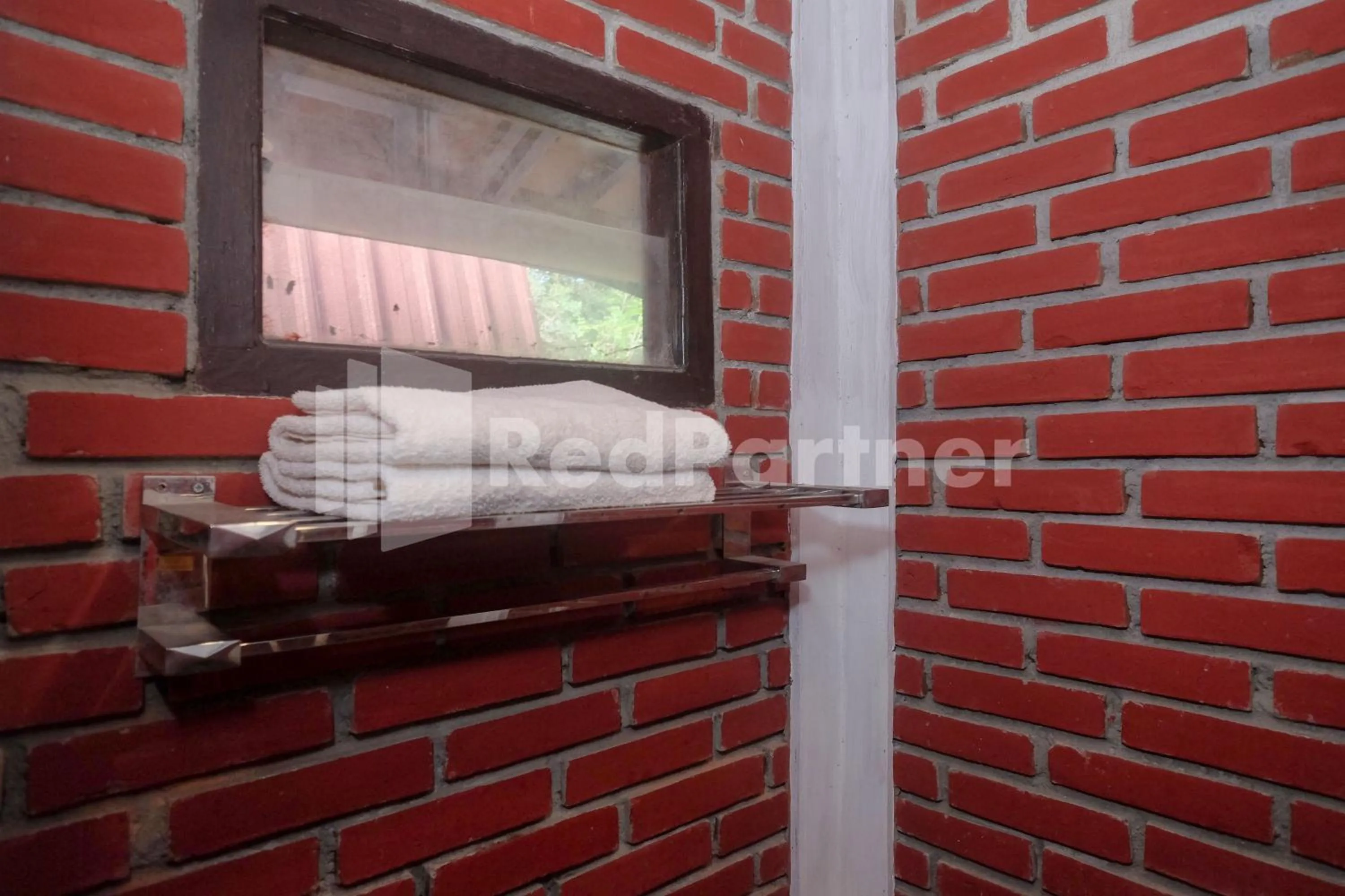 Bathroom in Kebon Krapyak Cottage Syariah Mitra RedDoorz near Stadion Maguwoharjo