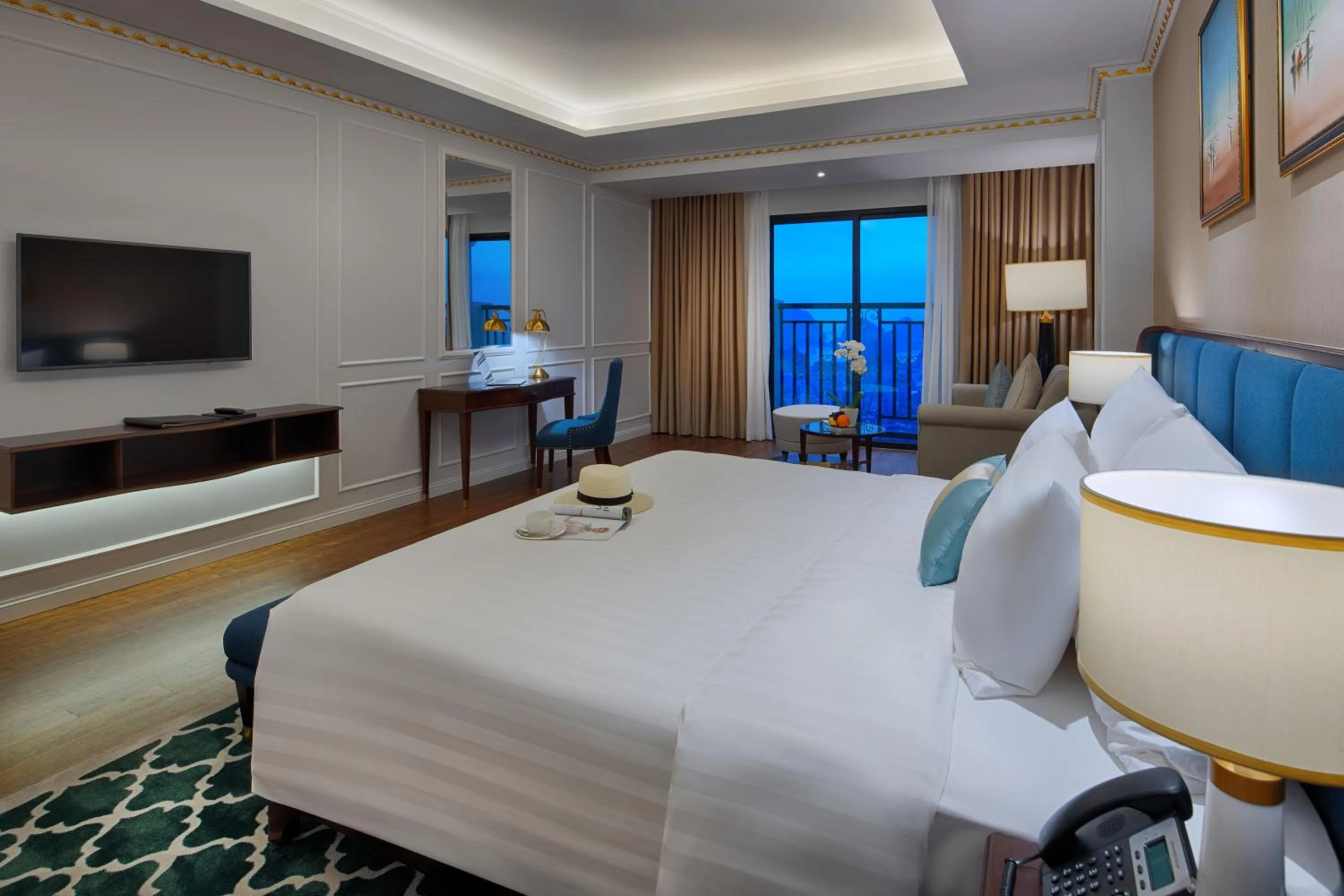 Photo of the whole room, Bed in FLC Halong Bay Golf Club & Luxury Resort