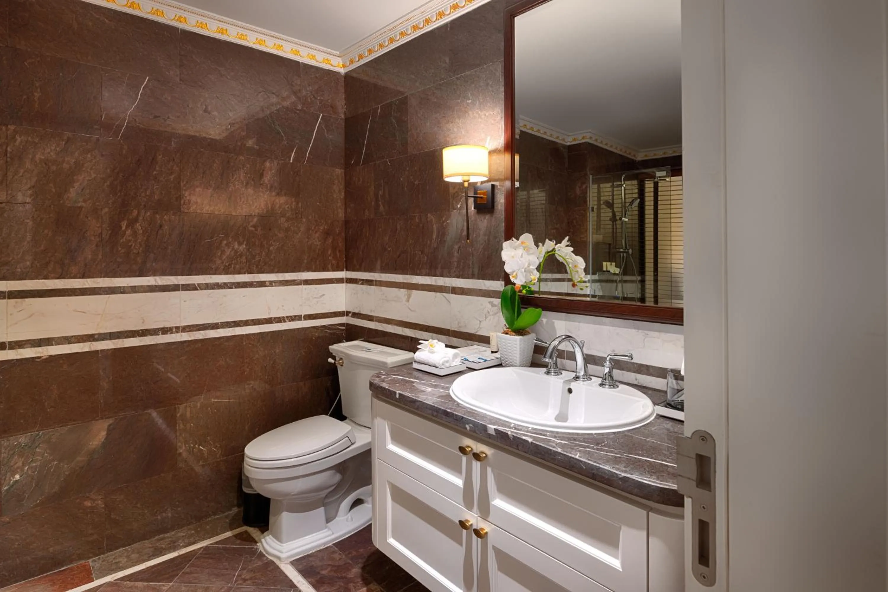 Toilet in FLC Halong Bay Golf Club & Luxury Resort