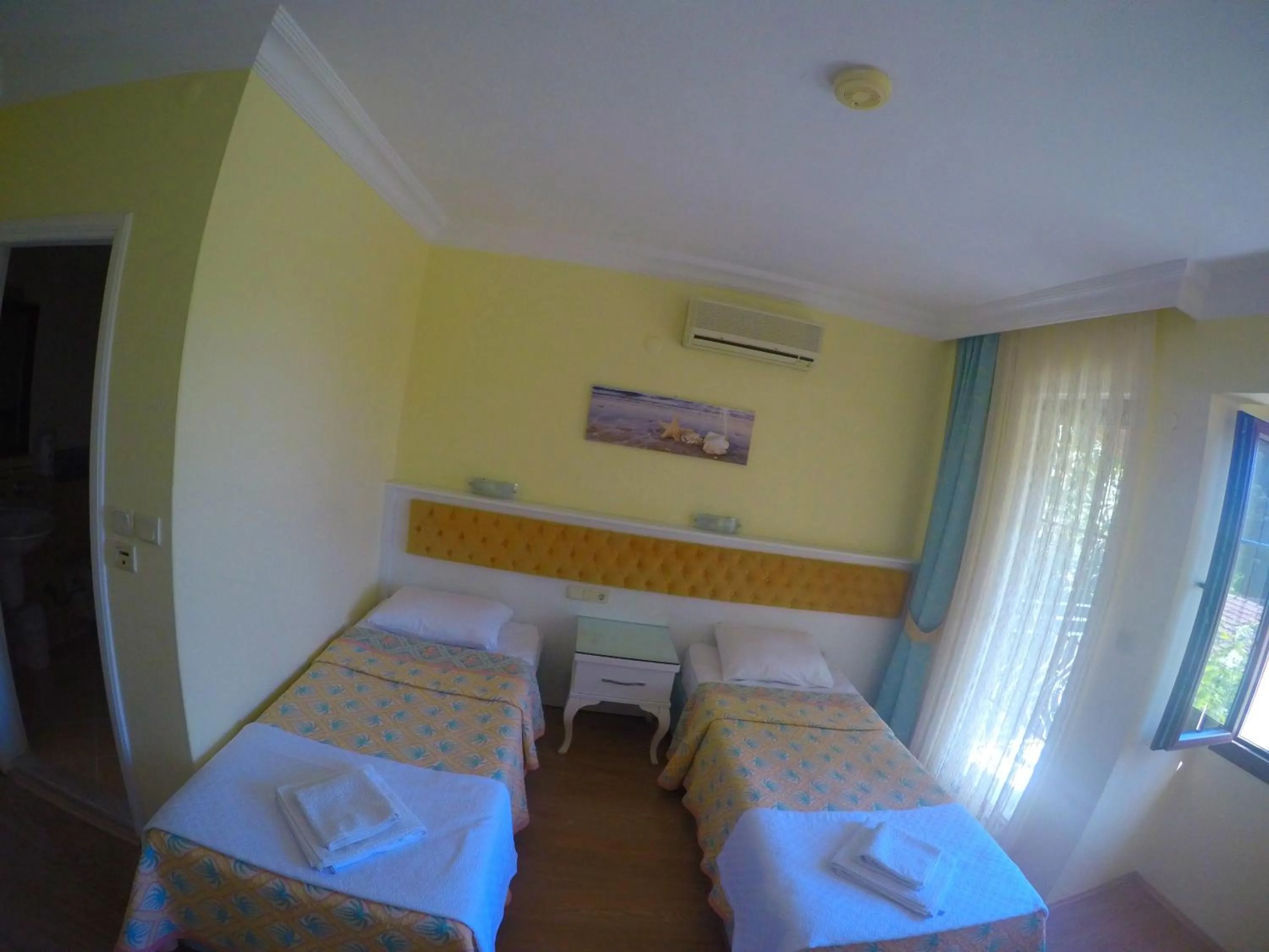 Bed in İlkiz Beach Hotel
