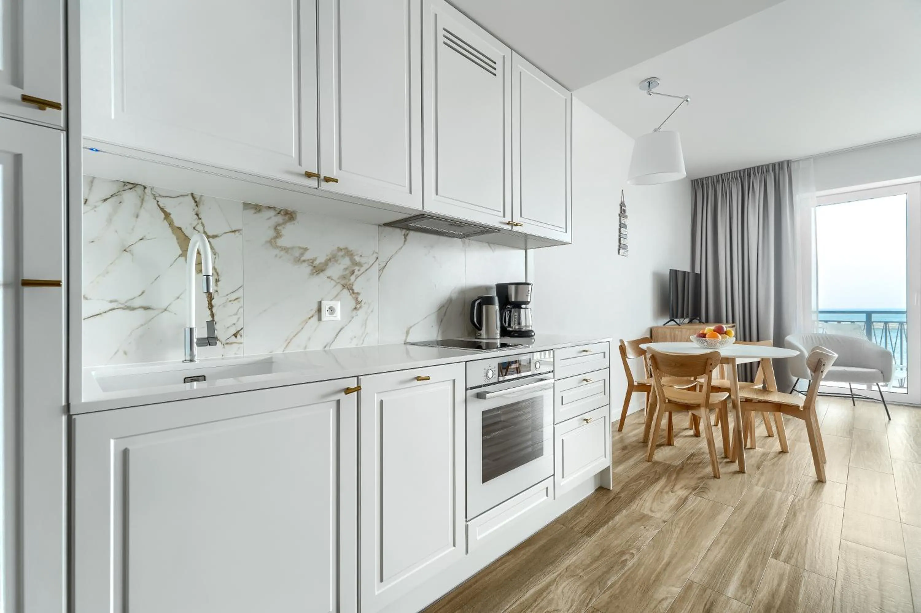 Kitchen or kitchenette in Apartamenty Marina z widokiem na morze