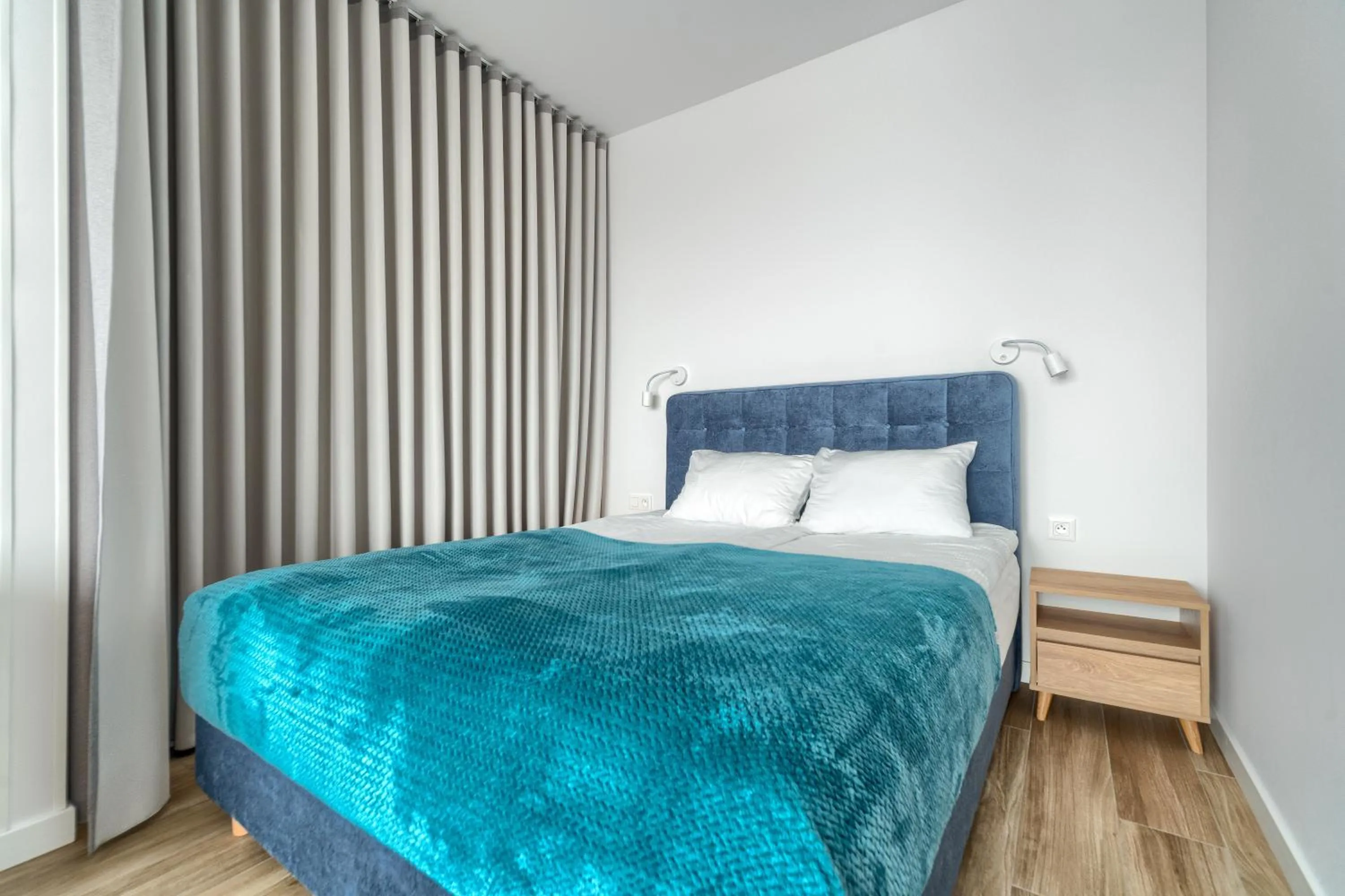 Bed in Apartamenty Marina z widokiem na morze