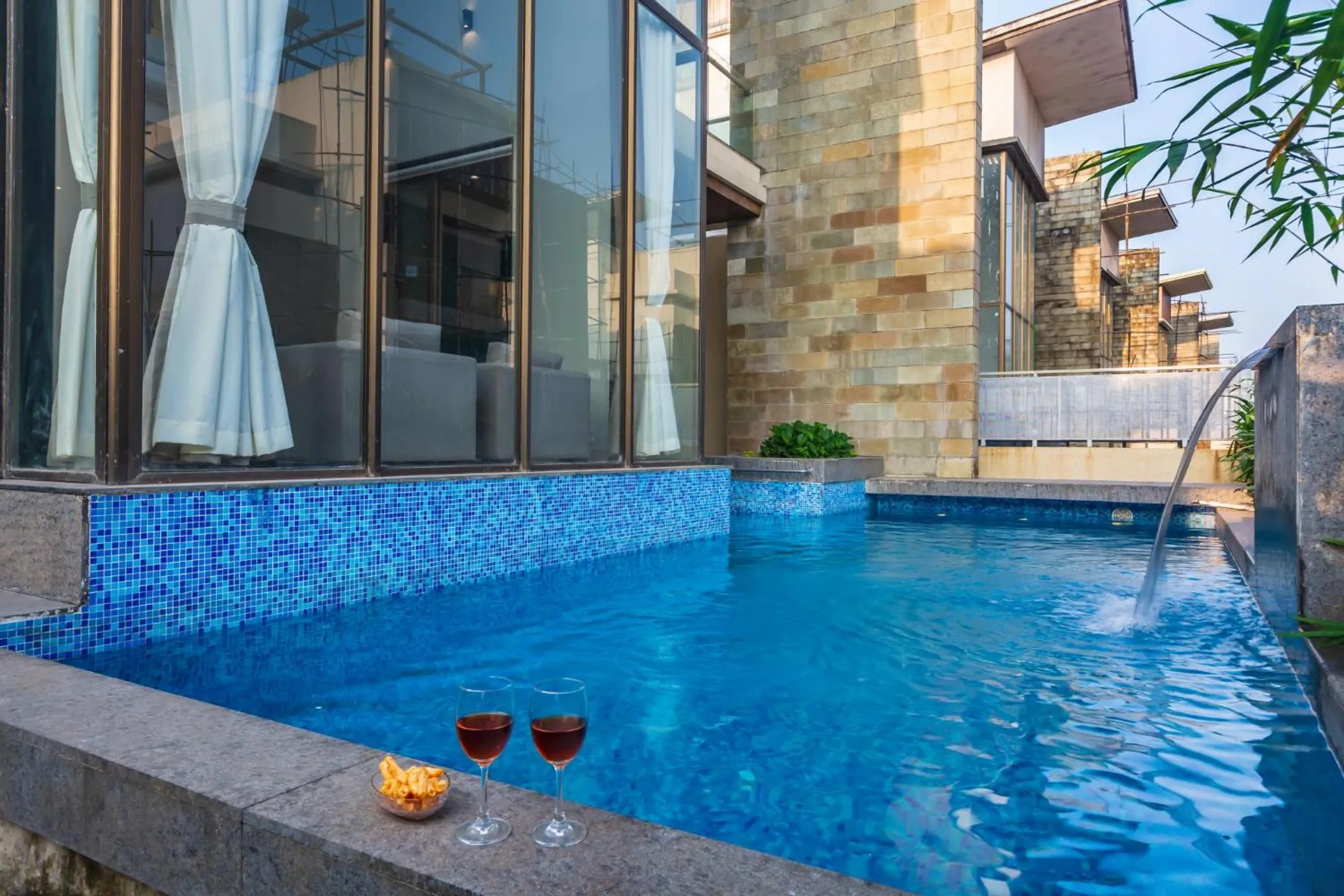 Spring in SaffronStays Aspen, Lonavala - luxury pool villa with games and TV room near Bhushi Dam