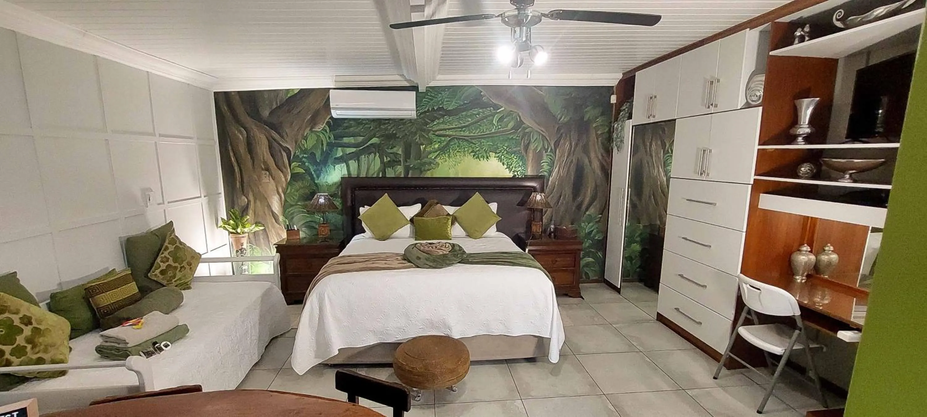 Bed in Rustic Forest Guest House