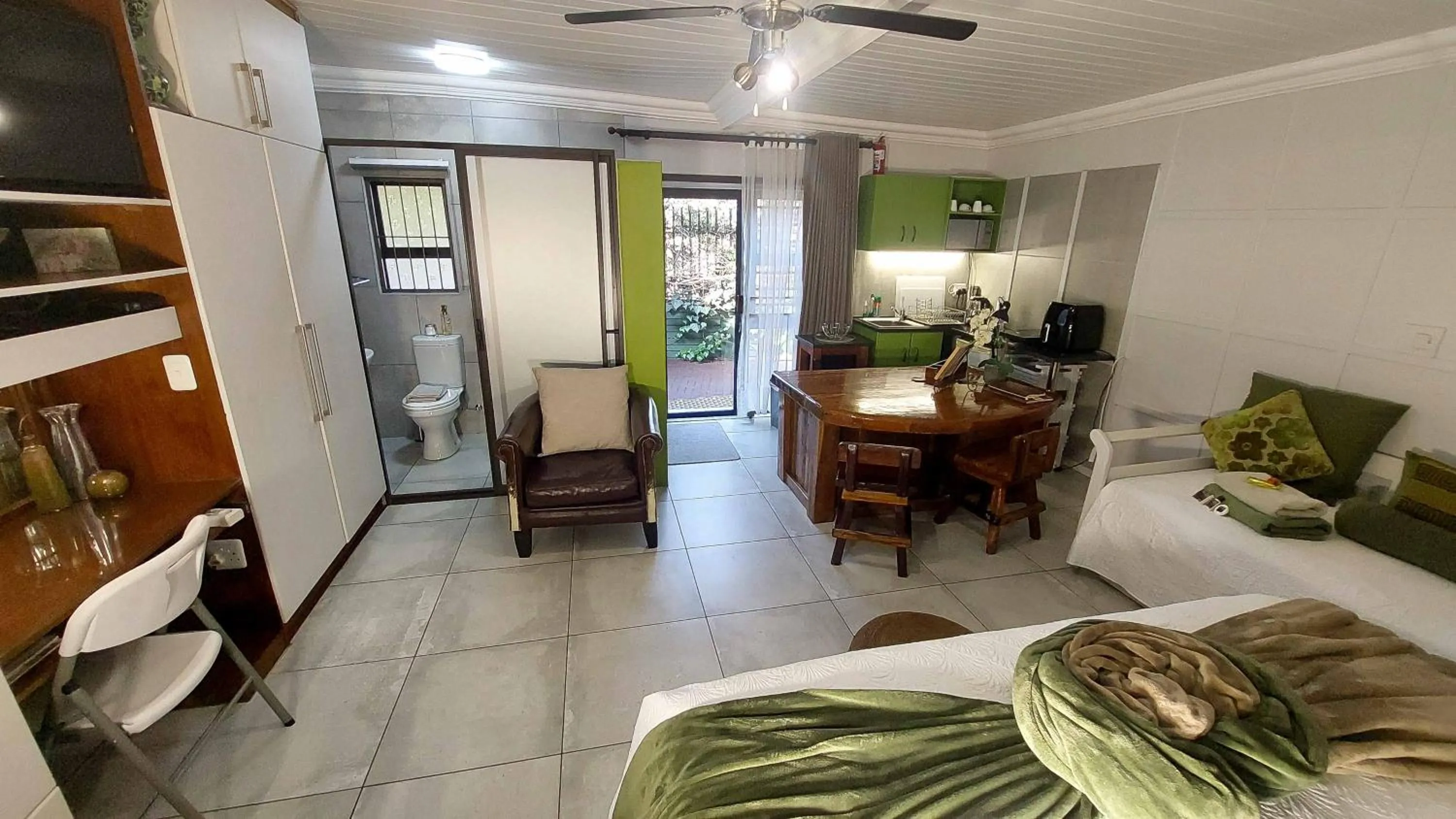 Bed in Rustic Forest Guest House