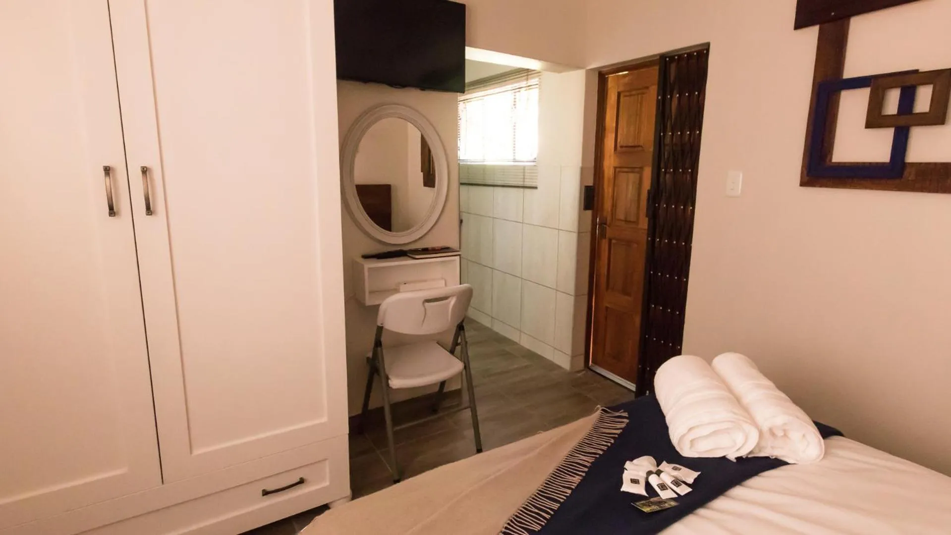 Bed in Rustic Forest Guest House