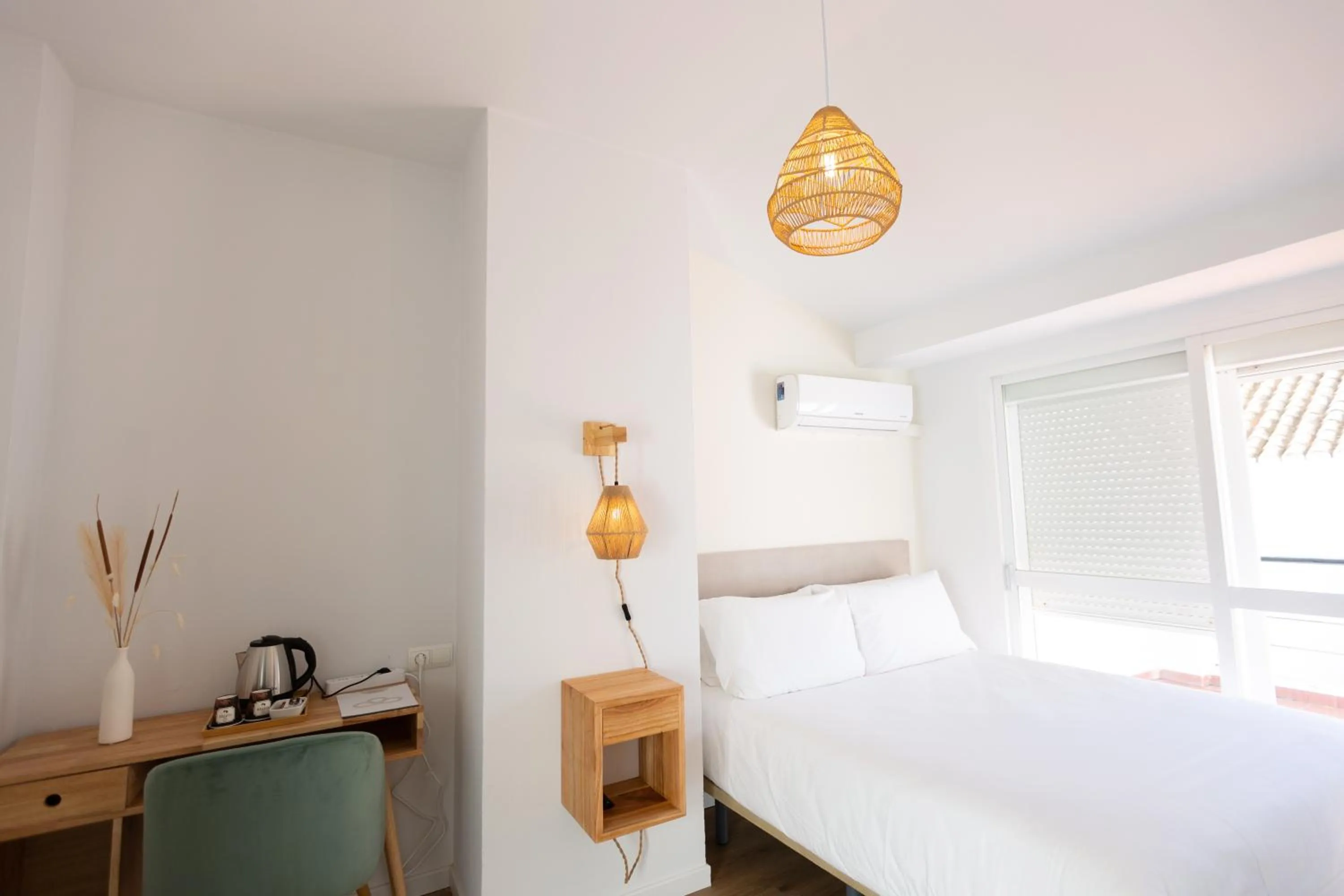 Bed in La Malagueña by Croma