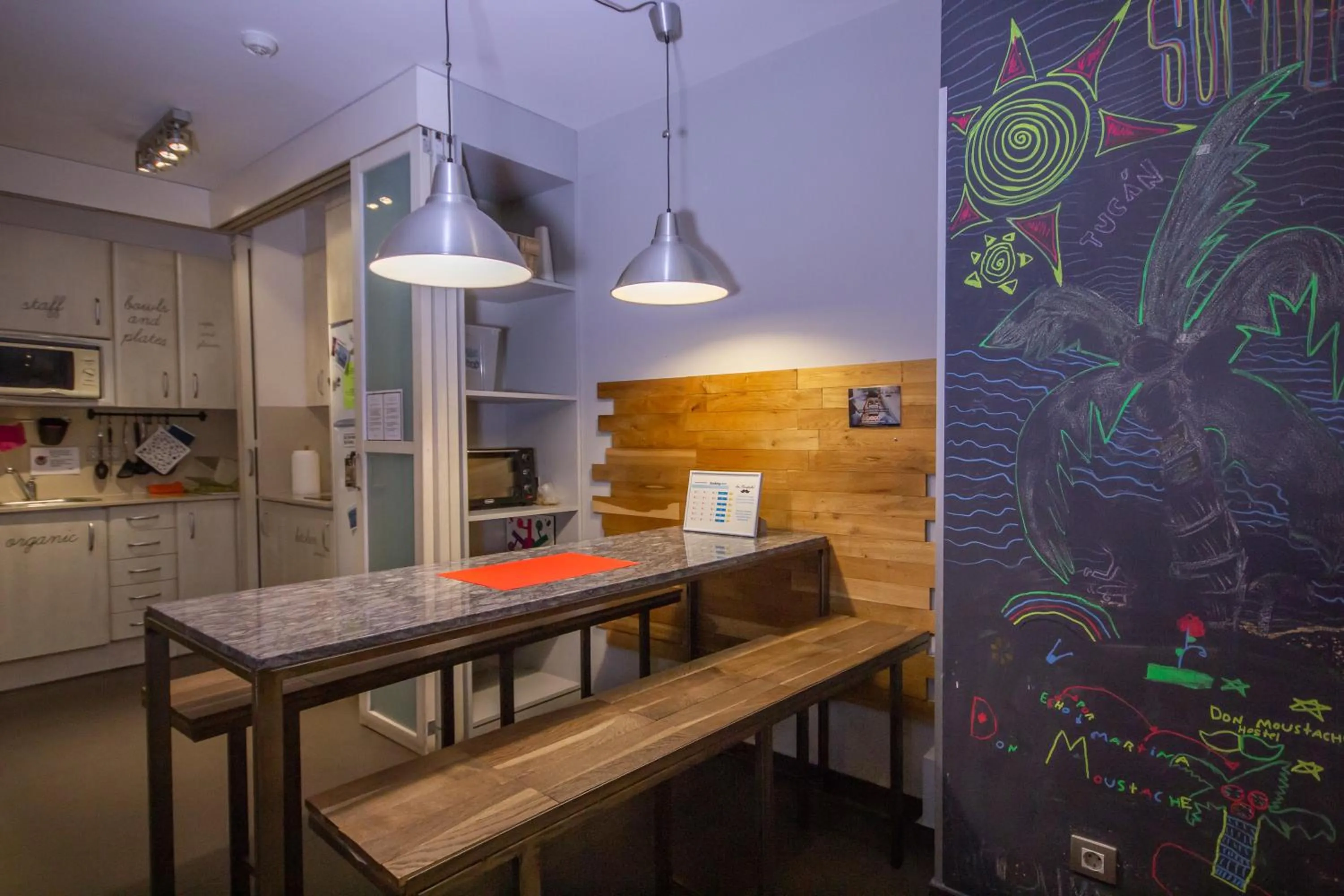 Communal kitchen in Don Moustache Boutique Hostel