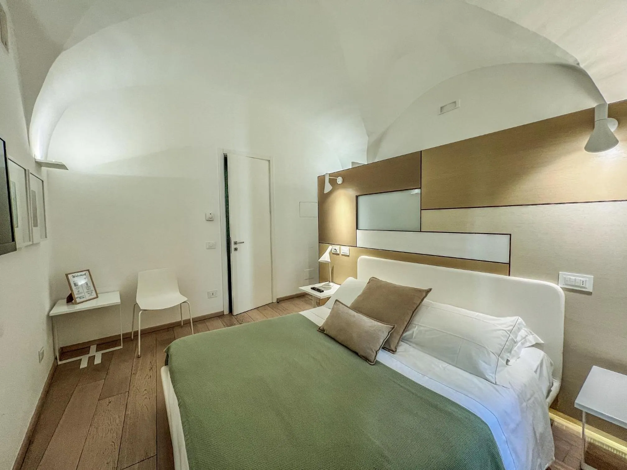 Bed in Santacroce Luxury Rooms